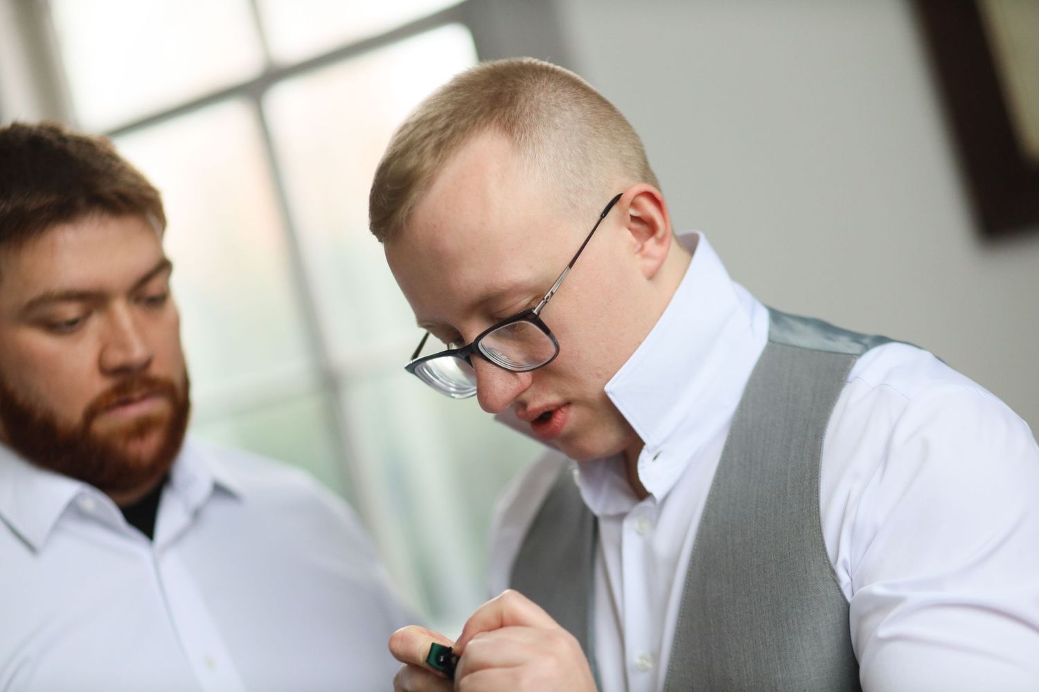 Indoor wedding ceremony at St. James Meeting House in Boardman, Ohio captured by Sarah Marie Studio