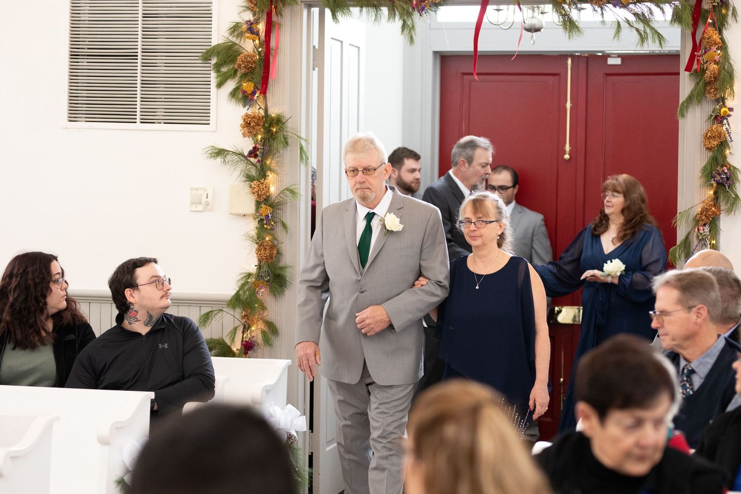 Indoor wedding ceremony at St. James Meeting House in Boardman, Ohio captured by Sarah Marie Studio