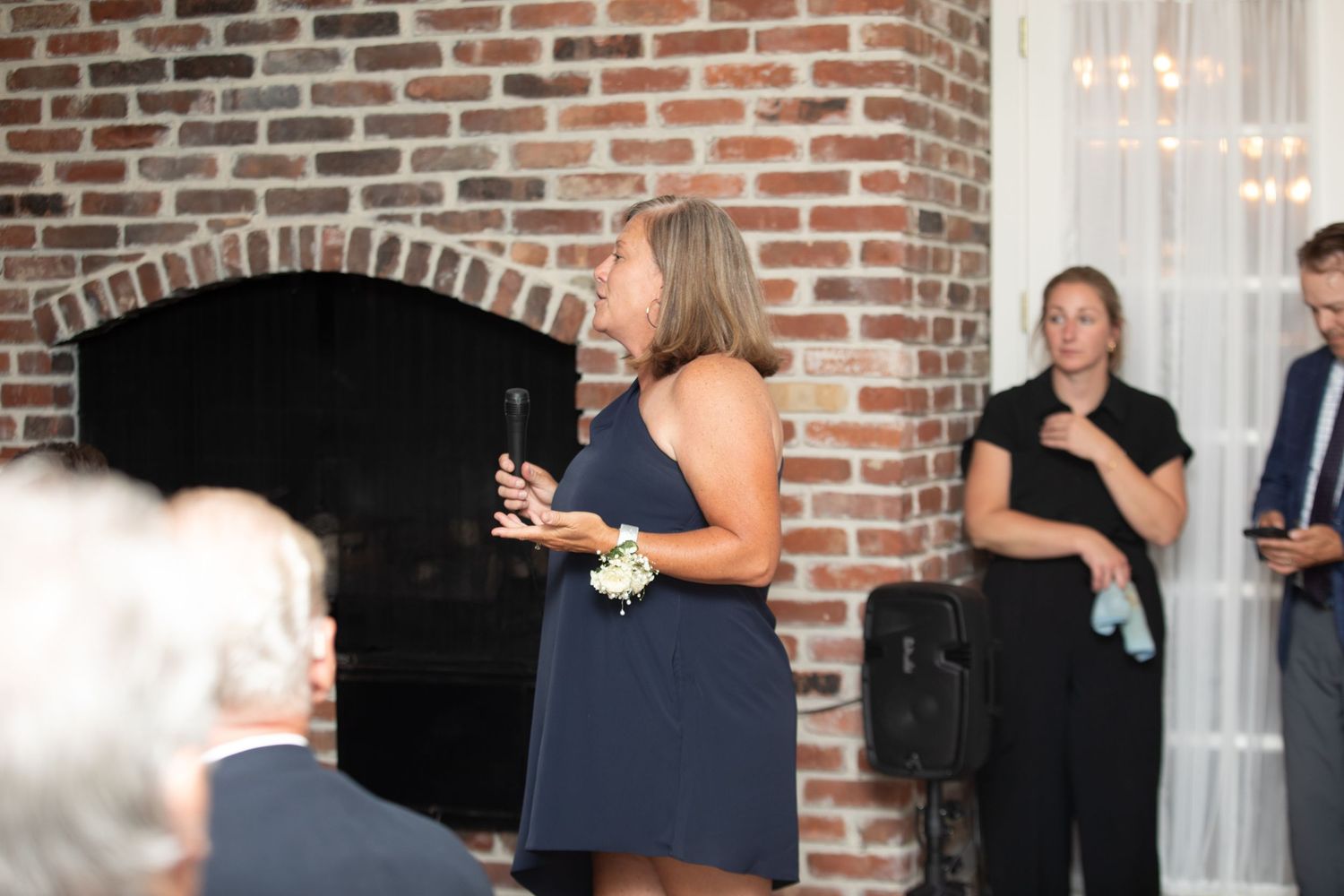 Candid wedding photography at a summer wedding at the Tanglewood Club in Chagrin Falls, Ohio by Sarah Marie Studio.
