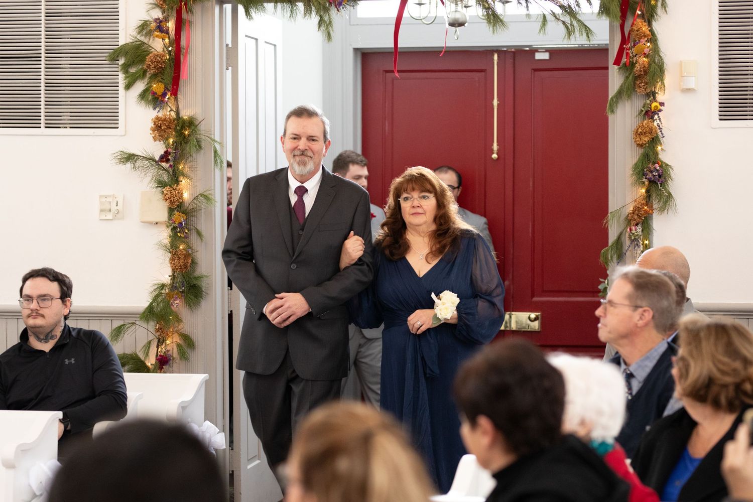 Indoor wedding ceremony at St. James Meeting House in Boardman, Ohio captured by Sarah Marie Studio