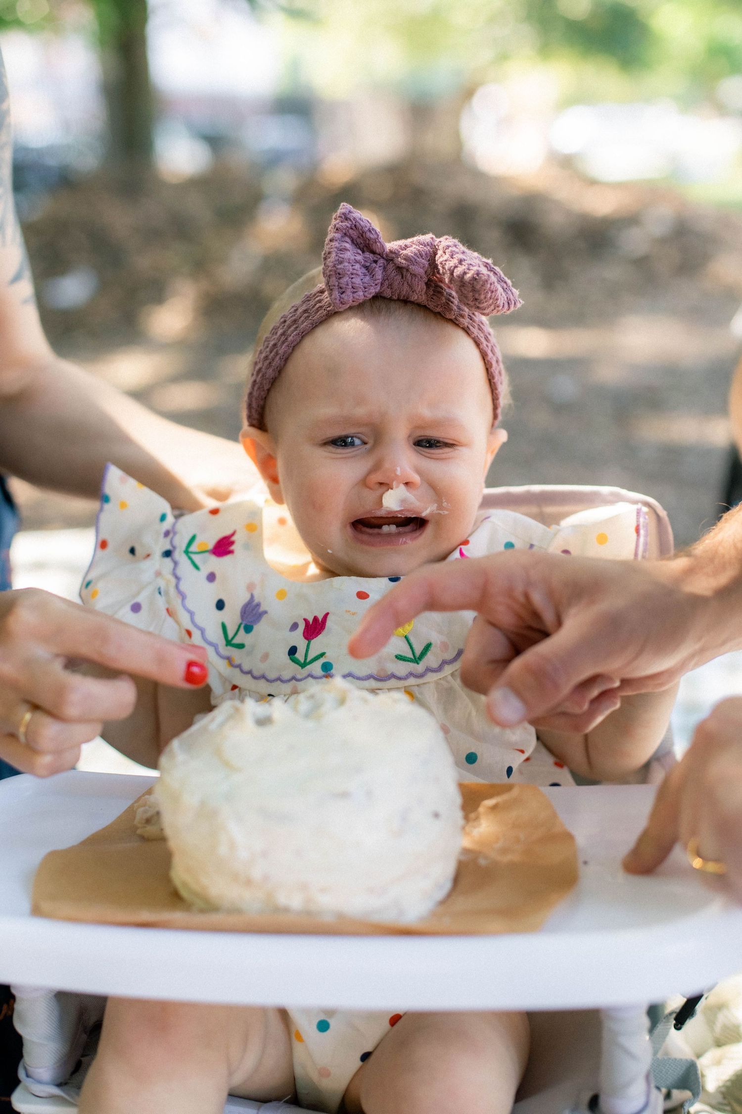 Candid, playful family photography. Baby's first birthday and the smash cake moment. Film + digital