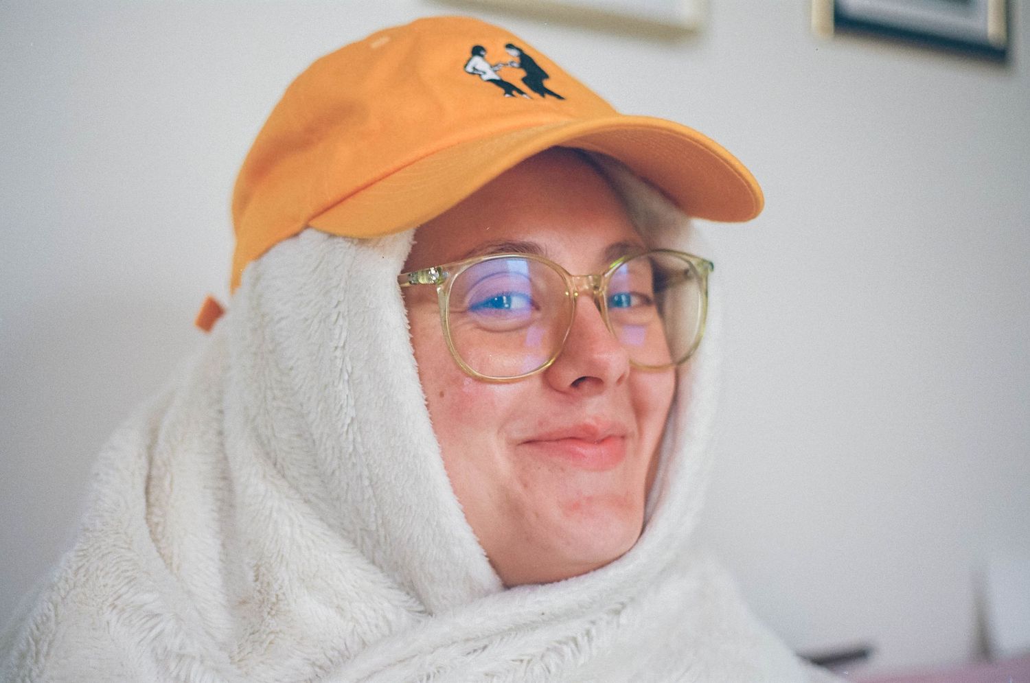 self portrait on 35mm portra film, brooklyn. girl with glasses