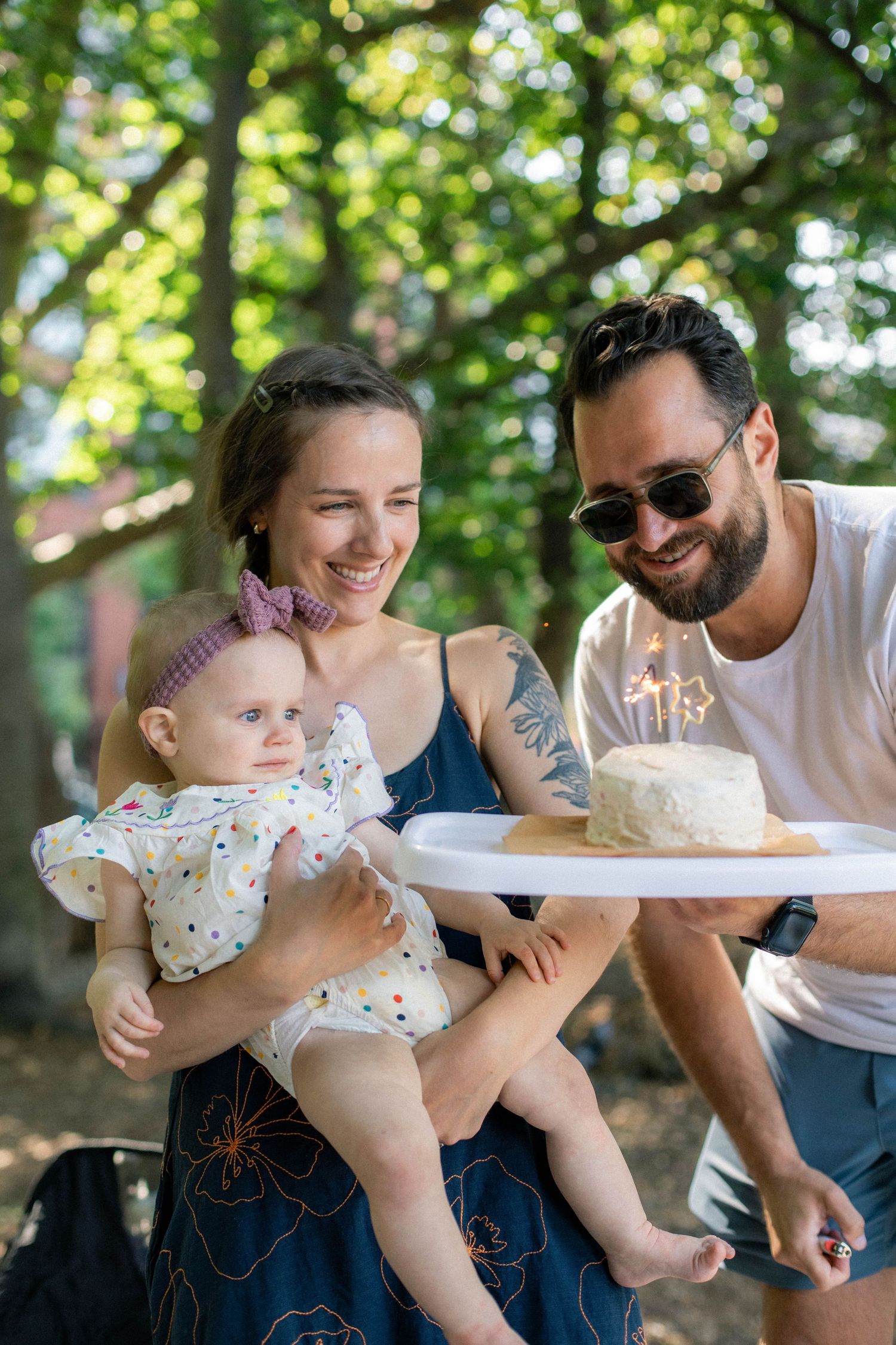 Candid, playful family photography. Baby's first birthday and the smash cake moment. Film + digital