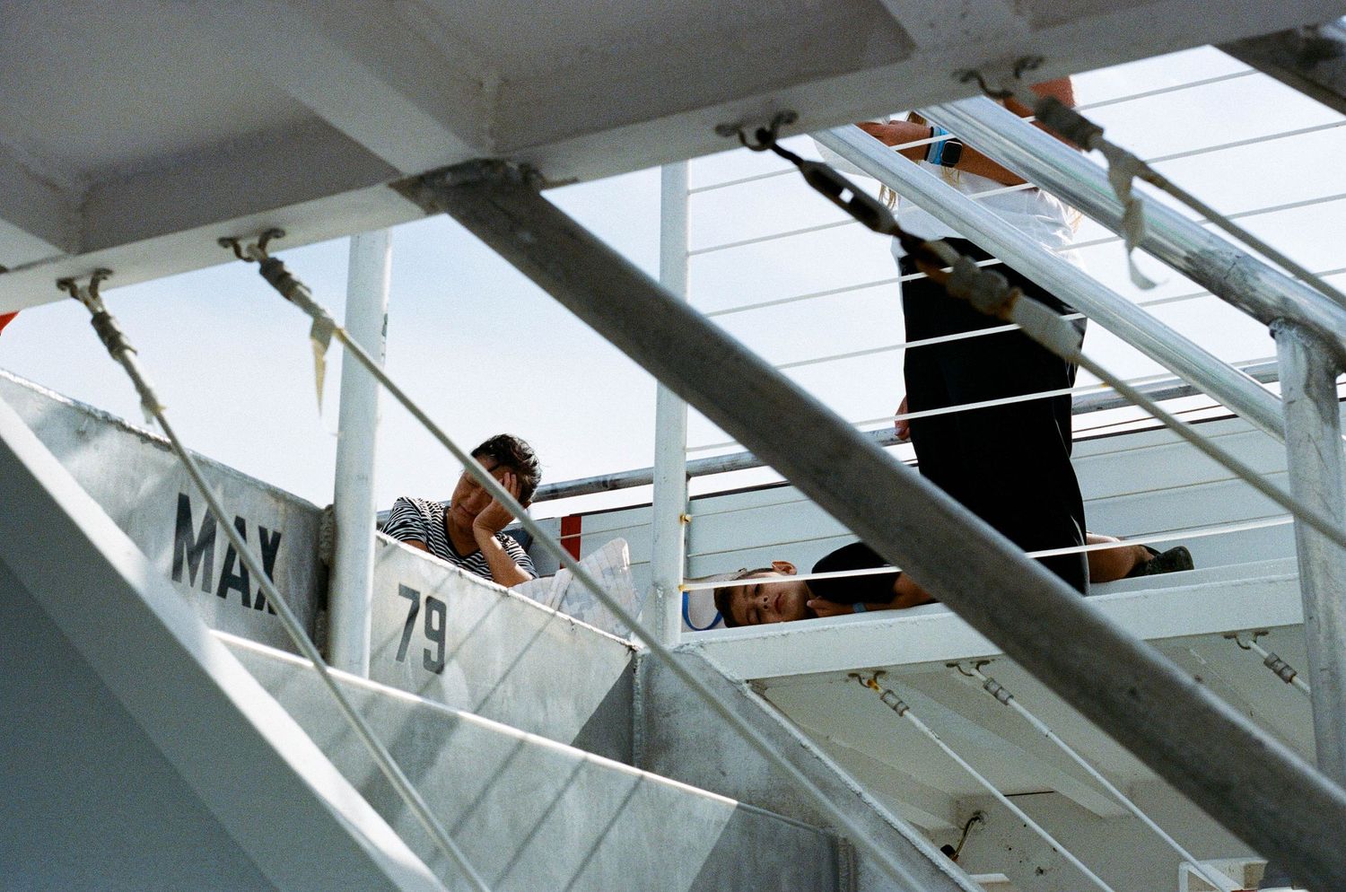 whale watching boat tour, photojournalist view. 35 mm film a24 vibes