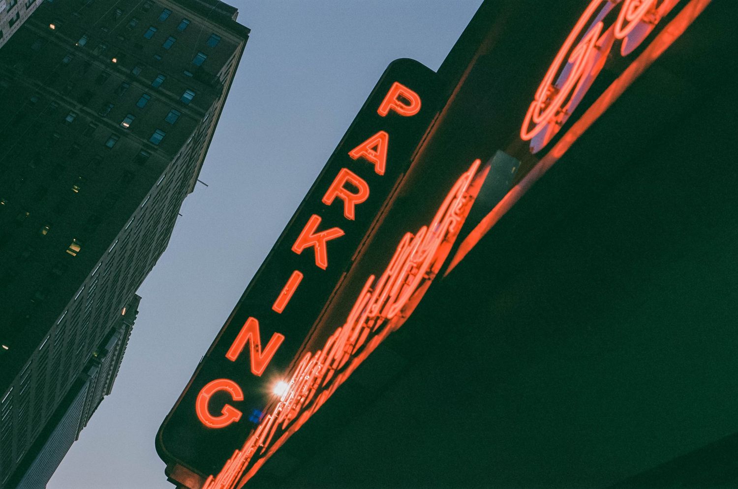 neon signs at night nyc on film late summer