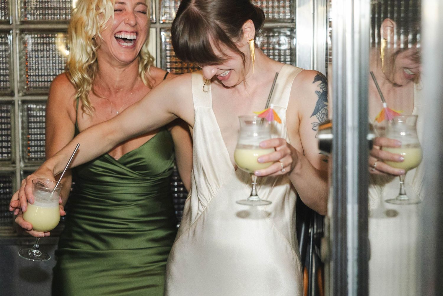 bride having a great time with friends, laughing