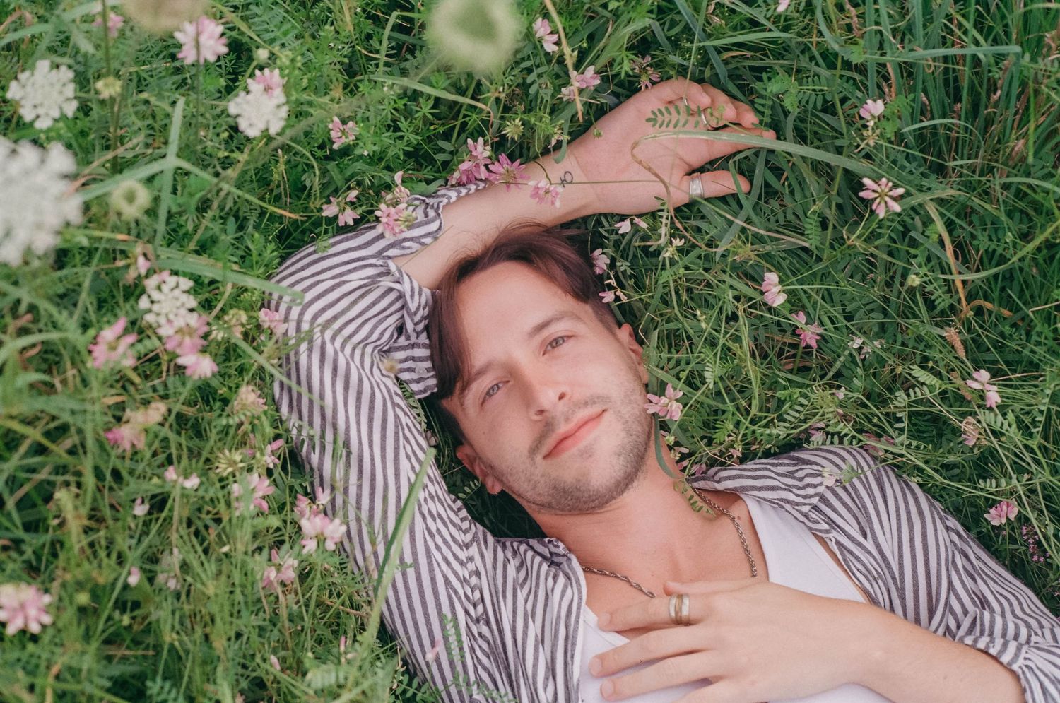 summer flowers on film man laying down romantic
