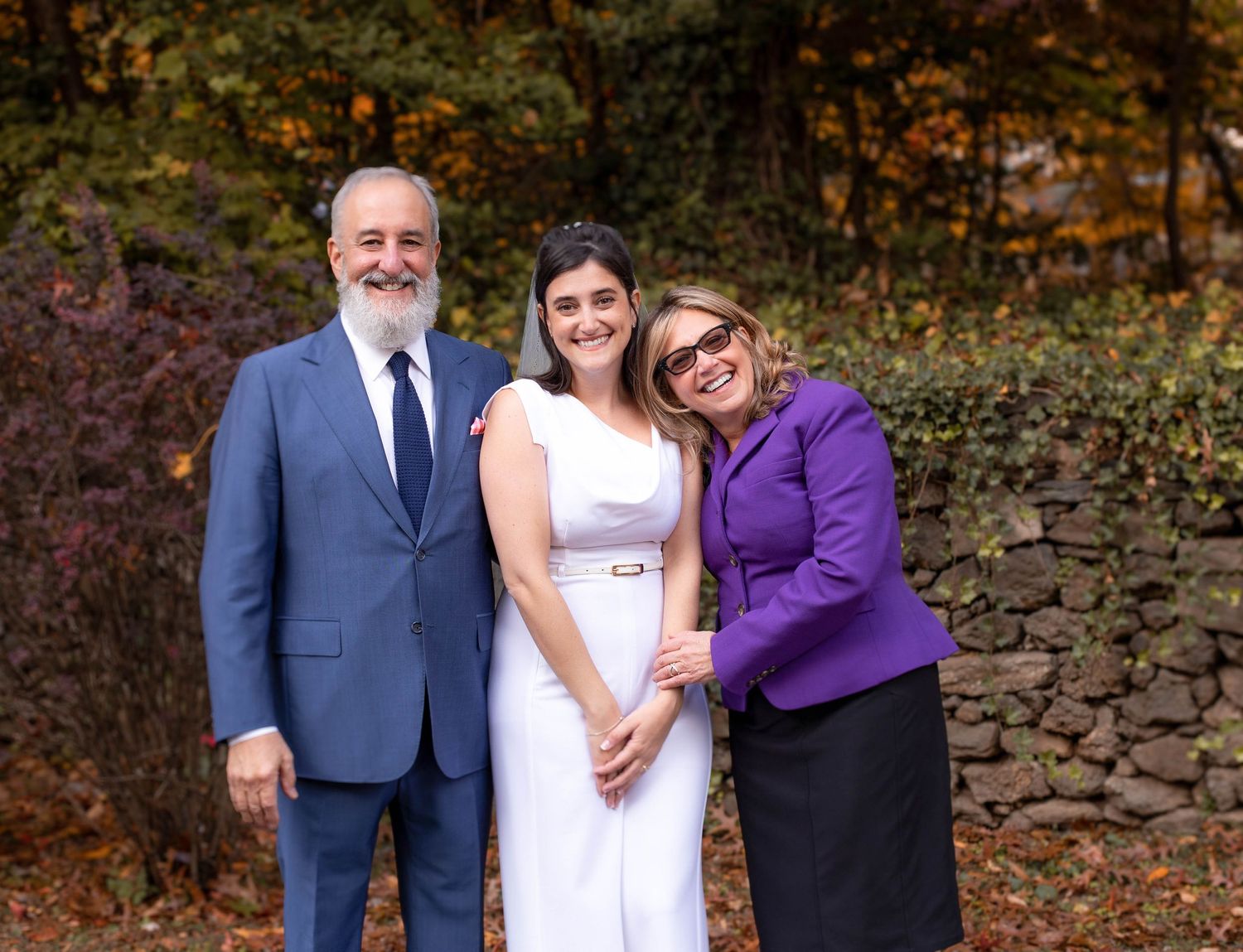 bride with parents family photos wedding ny