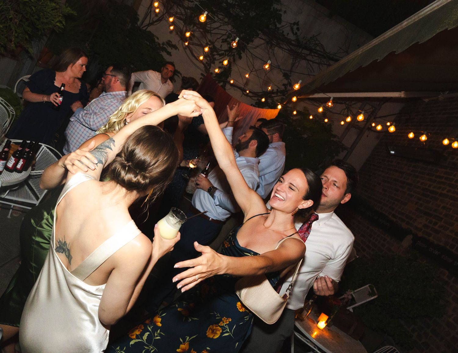 dance floor fun at wedding direct flash