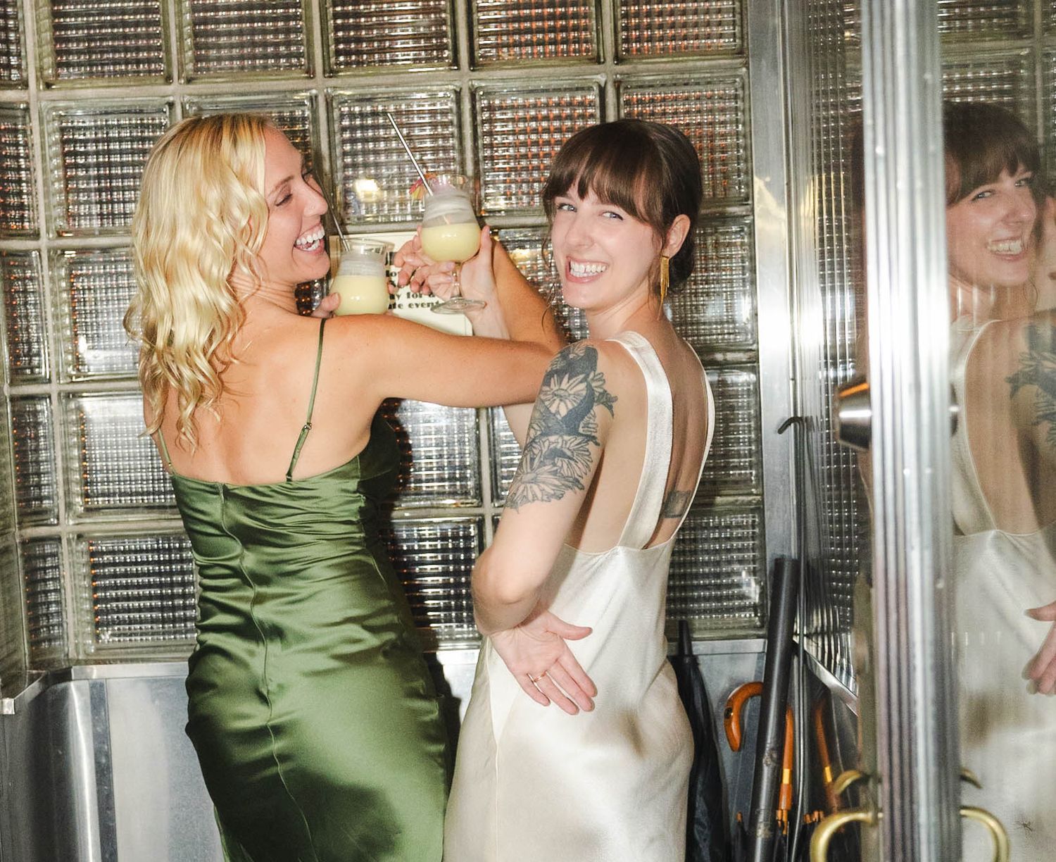 fun candid wedding photography. film and digital, bride and friends having a good time