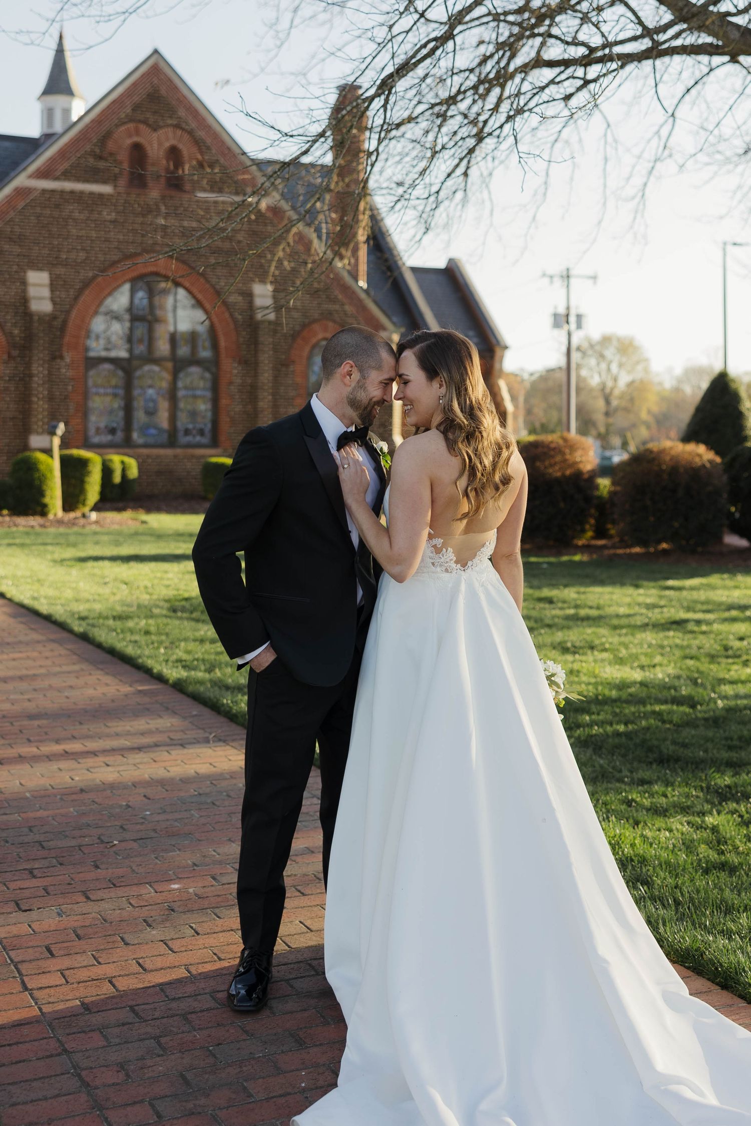Bride and groom portraits outside a Virginia church wedding venue