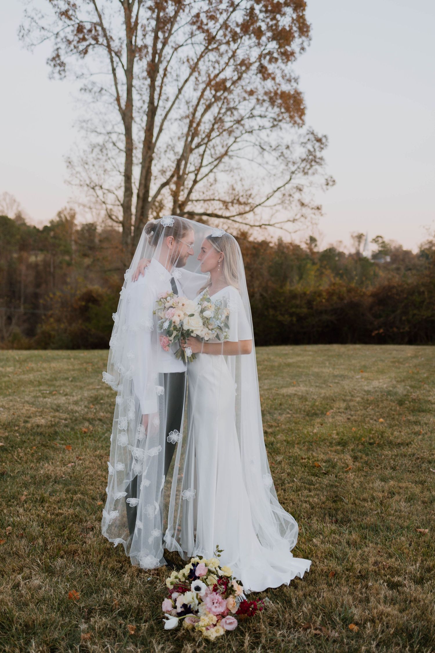 Bride and bride sharing a quiet moment during a Southwest Virginia outdoor wedding
