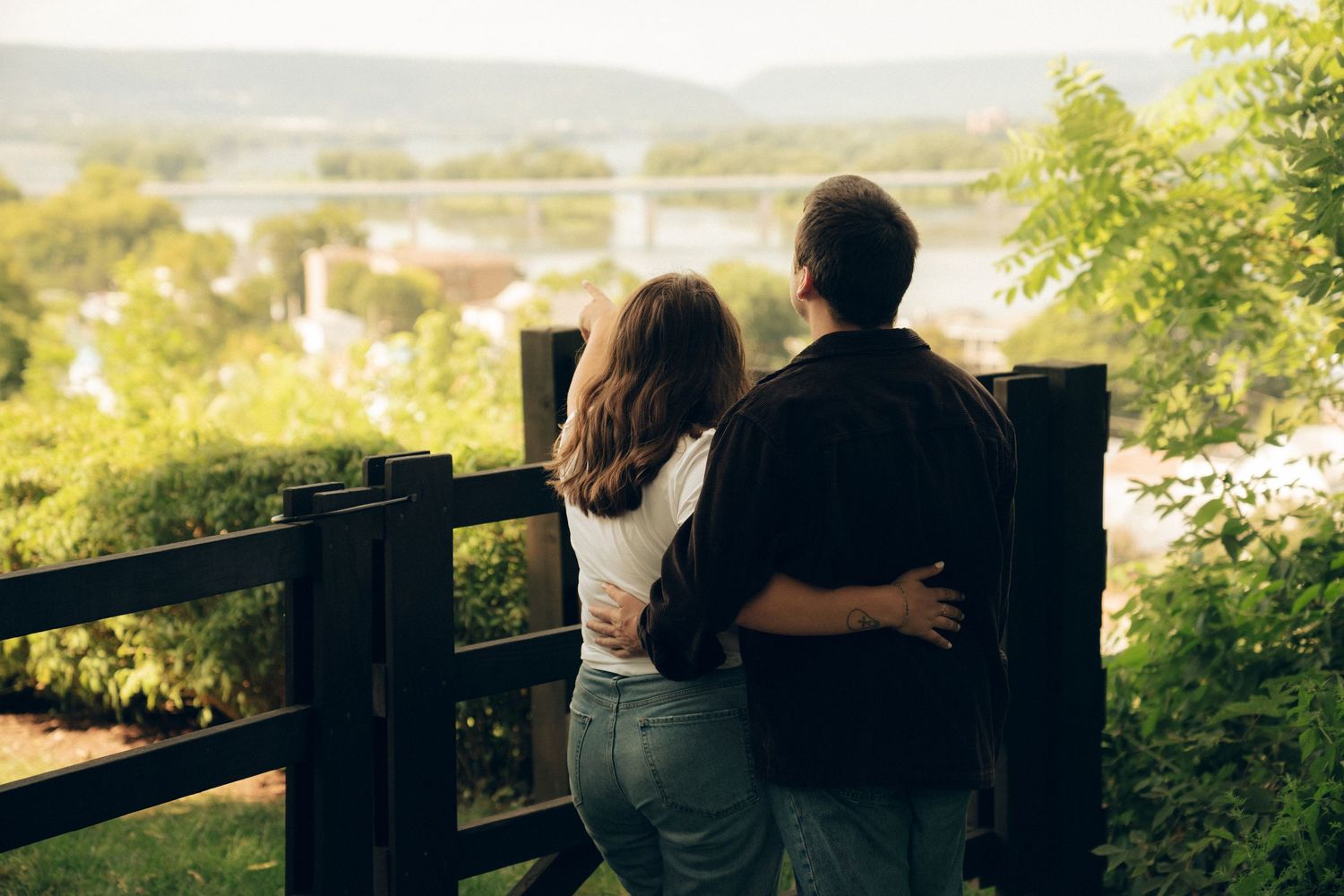 A scenic series of panoramic images showing people enjoying mountain views from an outdoor observation deck at sunset.
