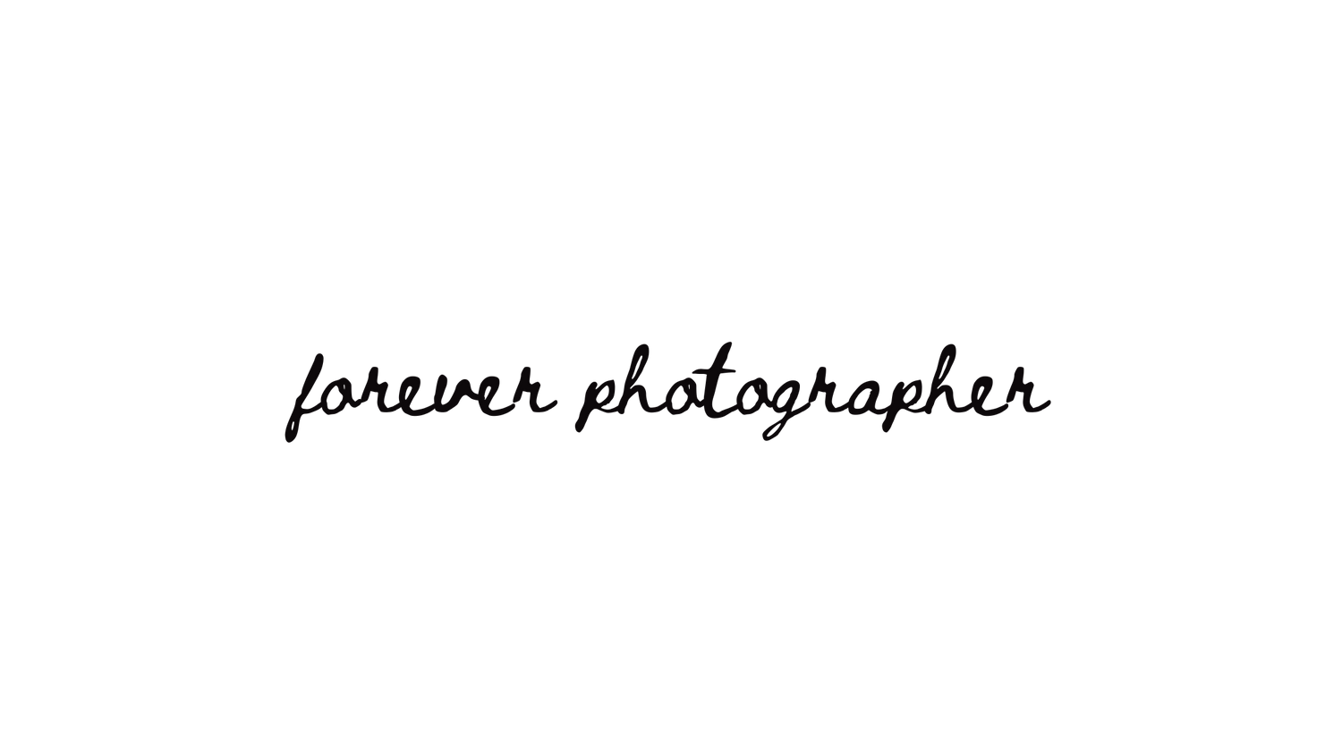 Black cursive text signature or handwriting against white background.