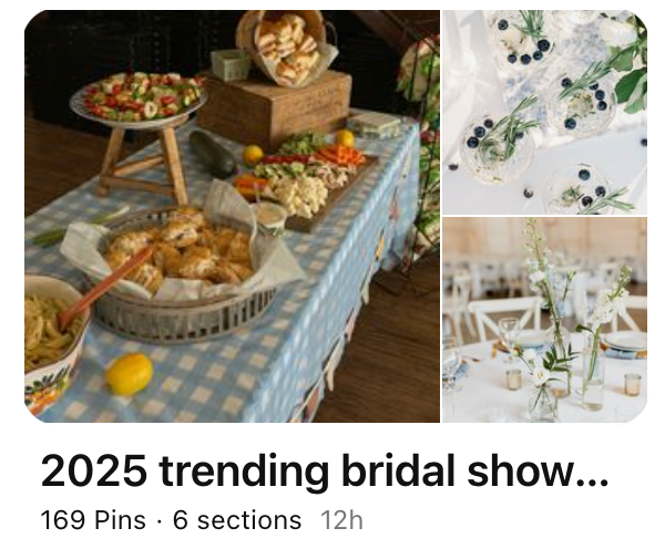 A rustic bridal buffet table with gingham tablecloth and elegant table settings adorned with white floral arrangements.
