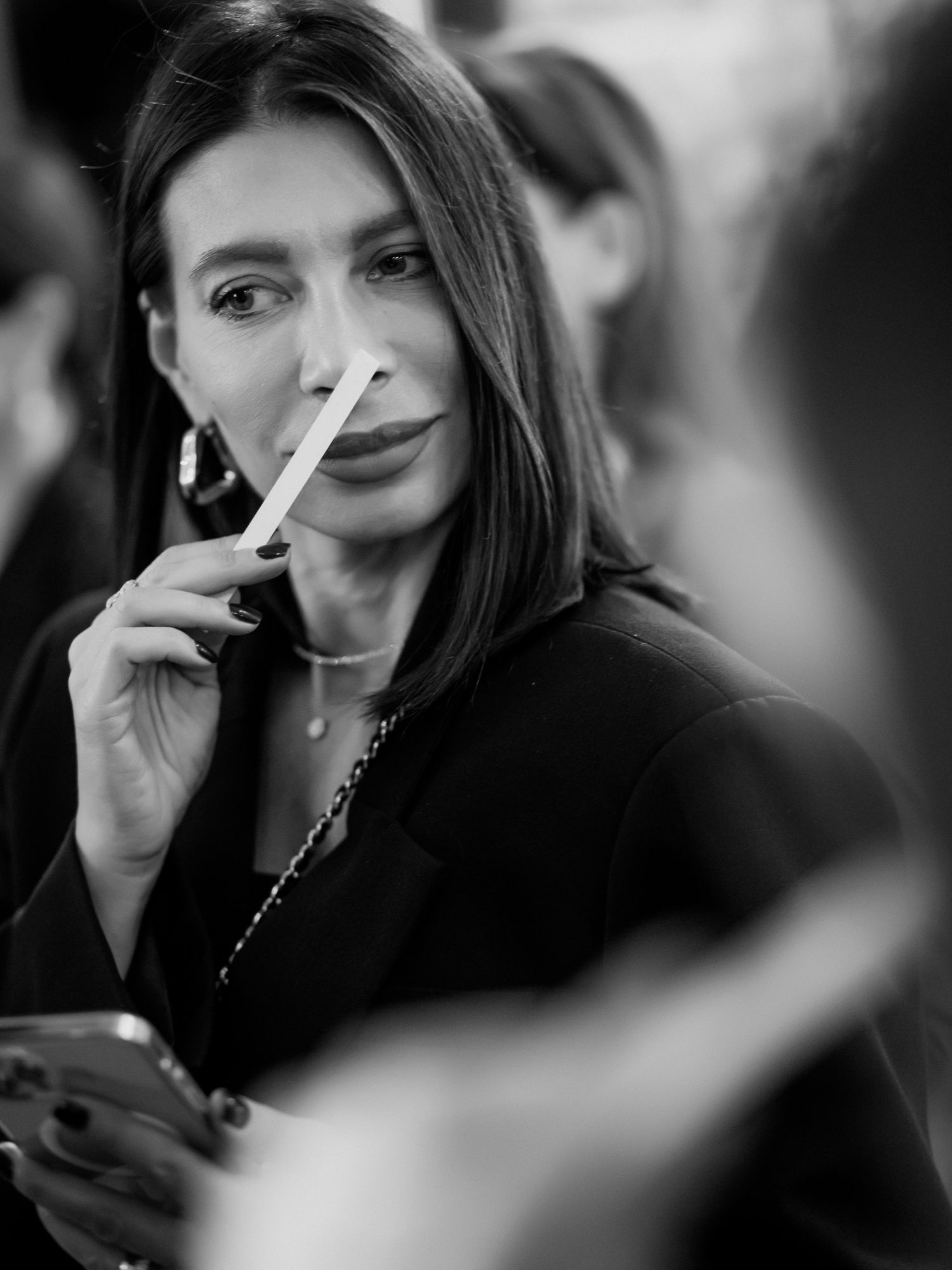 Black and white portrait with dramatic lighting.