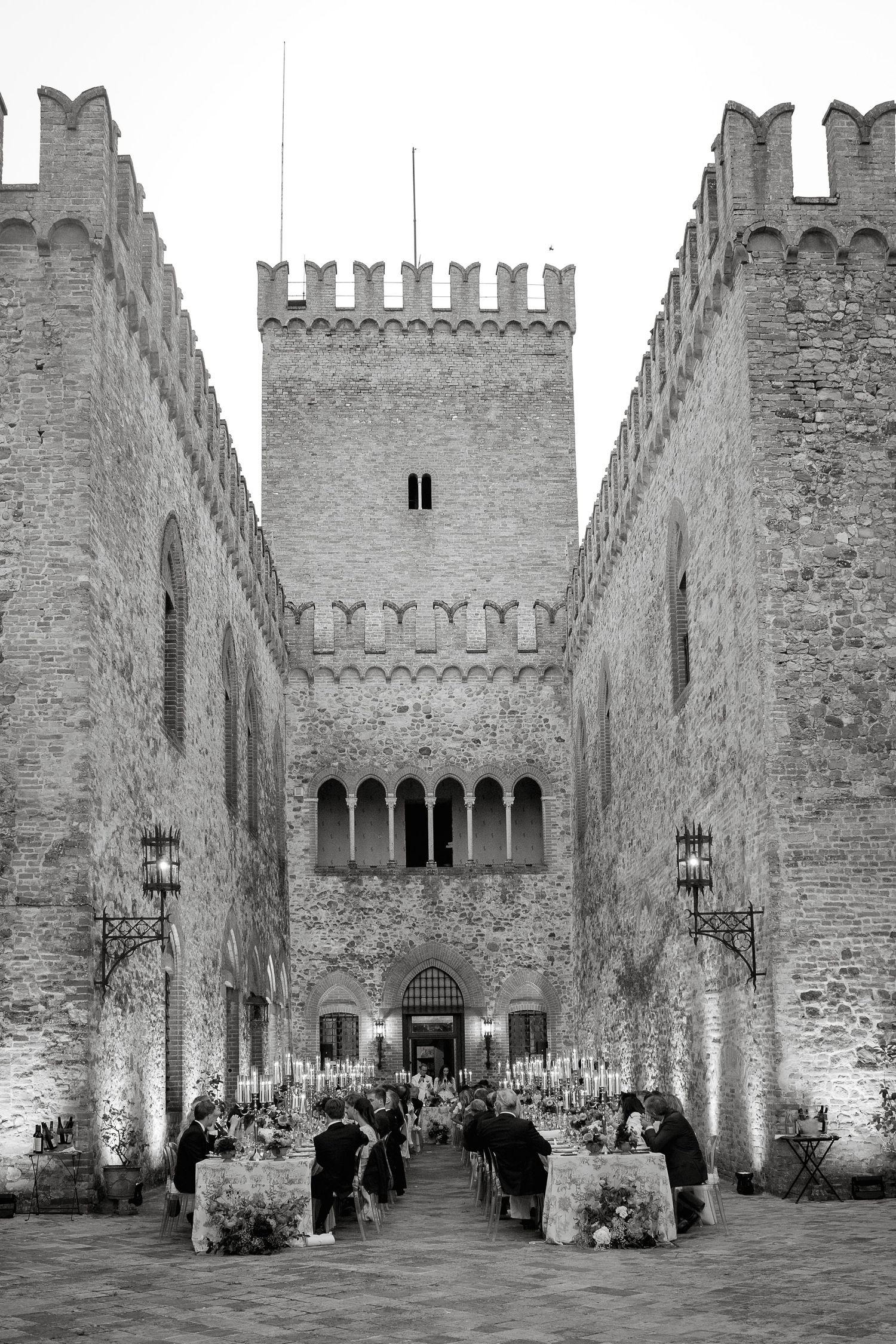 Elegant intimate destination wedding reception at a Tuscan castle. Luxury decor and sophisticated atmosphere captured by Gradisca Portento.