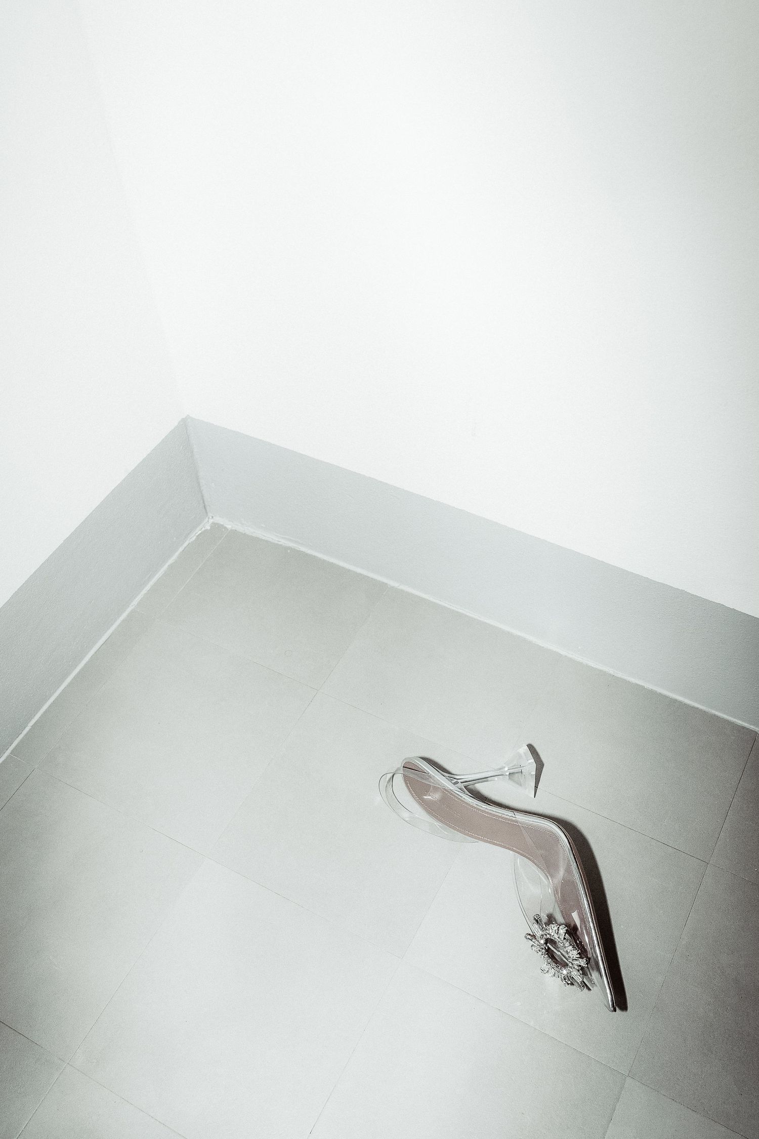 Editorial detail of bridal shoes during preparation at a luxury Puglia masseria. High-end wedding photography by Gradisca Portento.