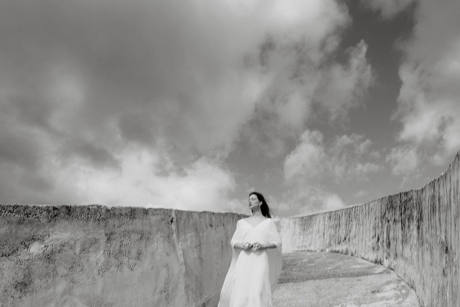 B&W bridal portrait at Cretto di Burri. Editorial style in a historic Italian art site by Gradisca Portento.