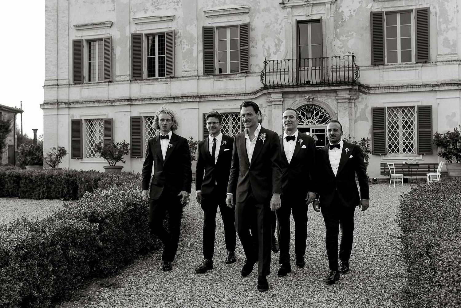 Groom and groomsmen at a Tuscan villa. International luxury wedding for a US TV star by Gradisca Portento.