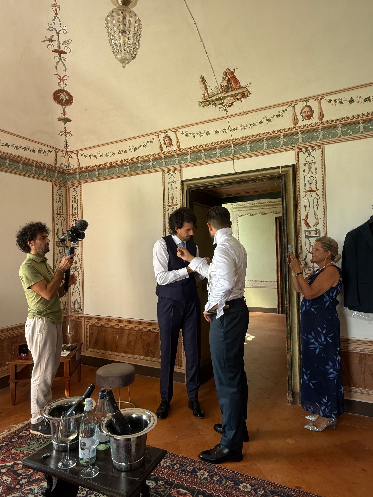 Candid iPhone photography of the groom’s preparations at the elegant Villa Fassati Barba, captured by Behind Wed Wedding Content Creator