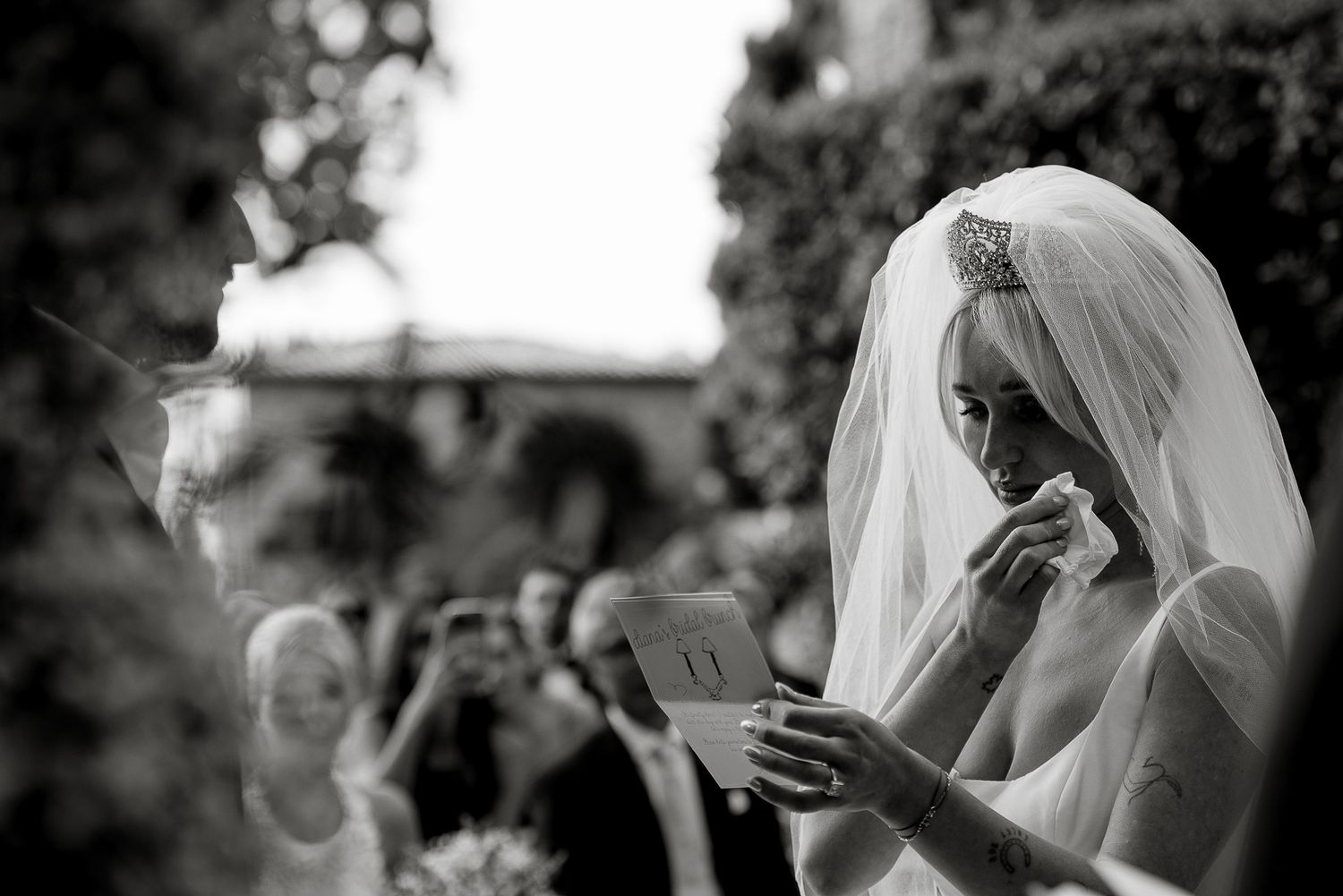Emotional moment at an exclusive wedding ceremony in Tuscany, held at the stunning La Pescaia Resort, capturing authentic, intimate vibes.