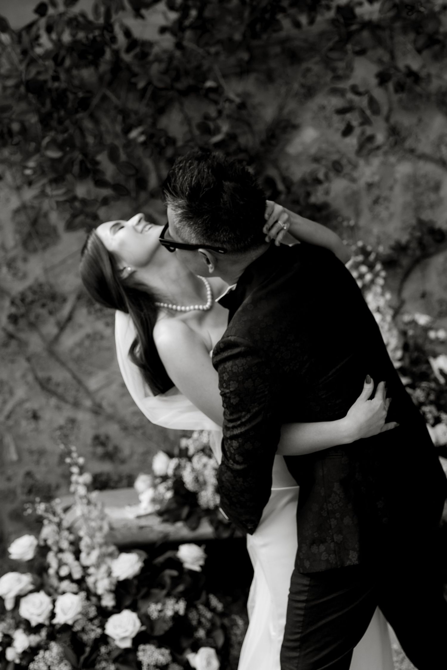 A candid moment just after saying 'I do' at stunning Borgo Santo Pietro. Boutique wedding photography in Tuscany Gradisca Portento.
