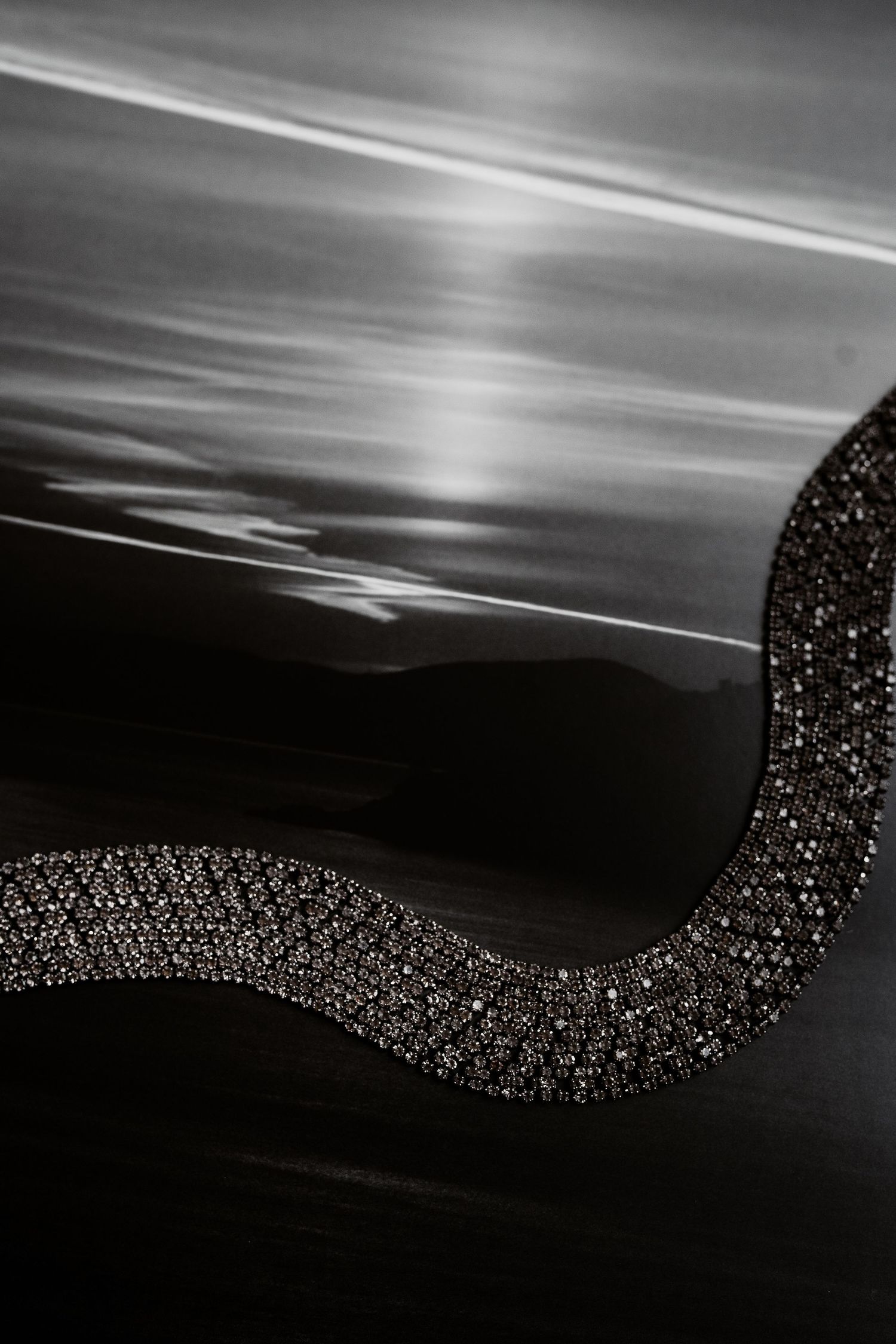 Editorial B&W detail of a bridal necklace. Chic destination wedding in Rome captured by Gradisca Portento.