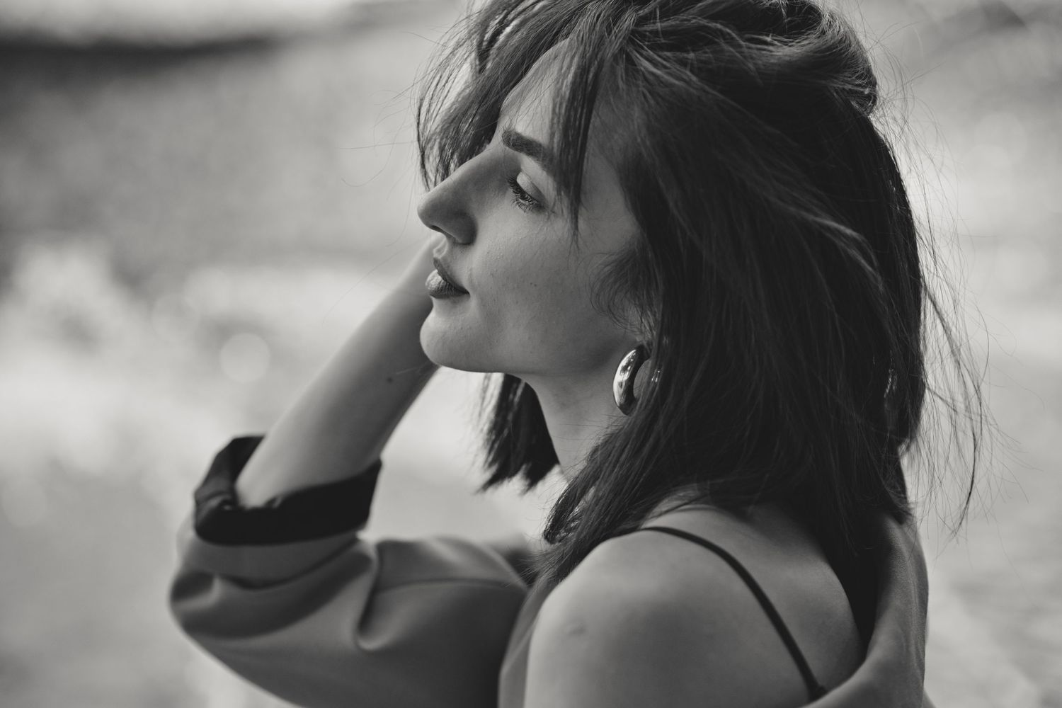 Dramatic black and white portraits capturing emotive expressions and poses.