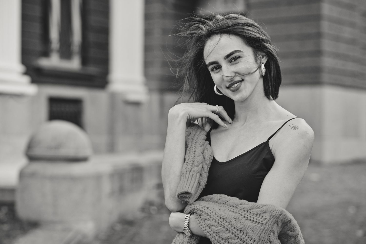 Black and white candid portraits showing natural expressions and smiles.