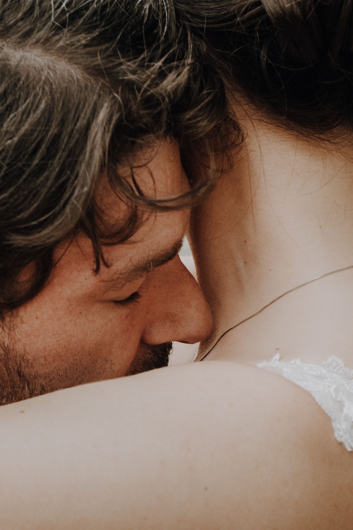 Intimate close-up artistic shot with soft focus and dreamy lighting.