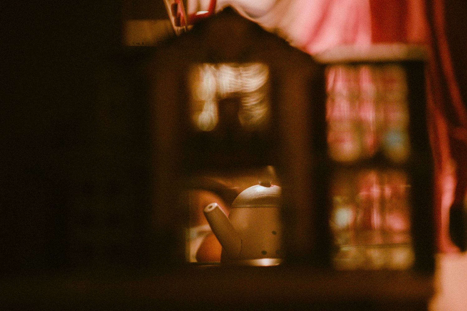 Warm glowing lights create a cozy atmosphere in a dimly lit interior.