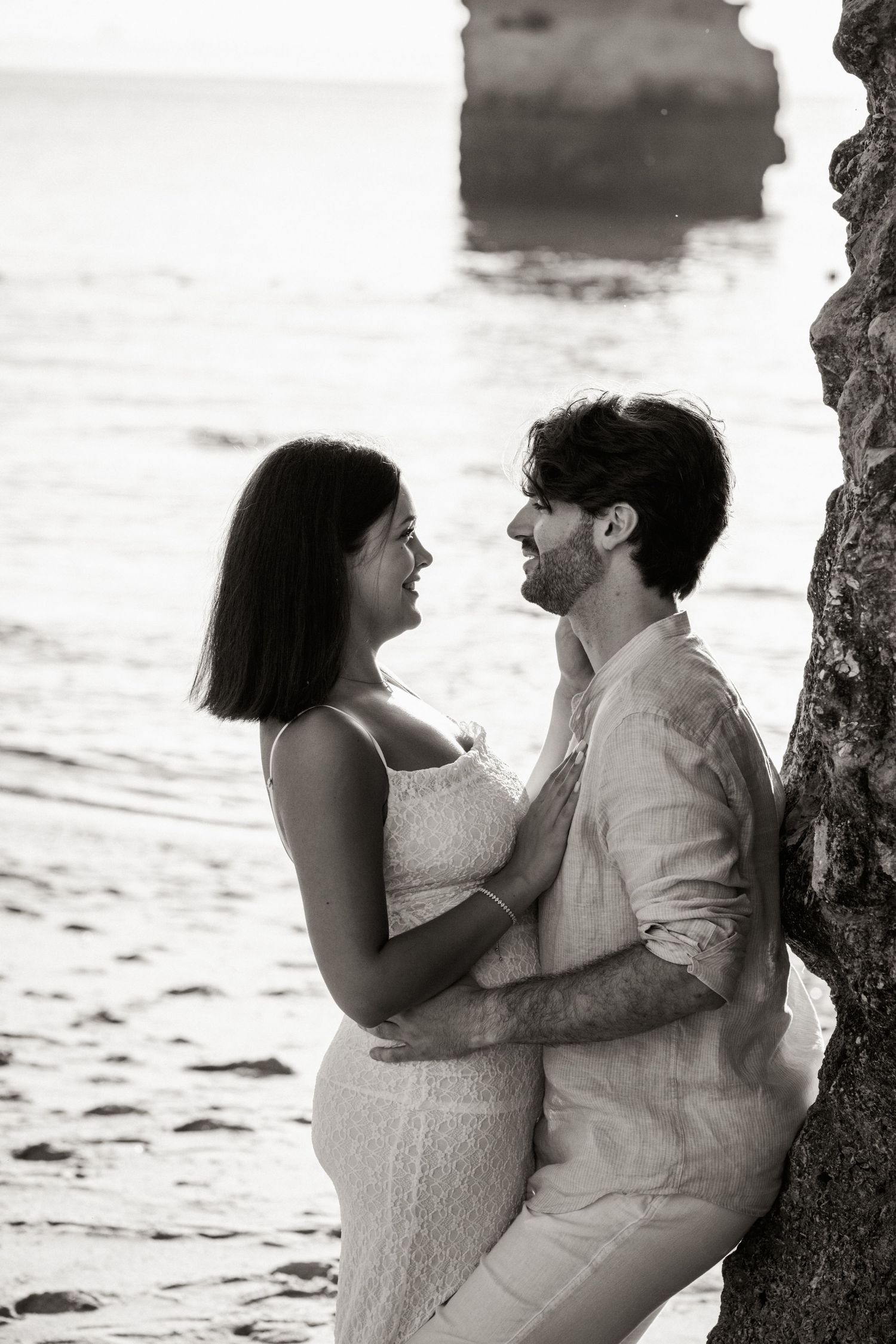 couple engagement proposal at dawn on iconic cliffs of Praia da Camilo Lagos