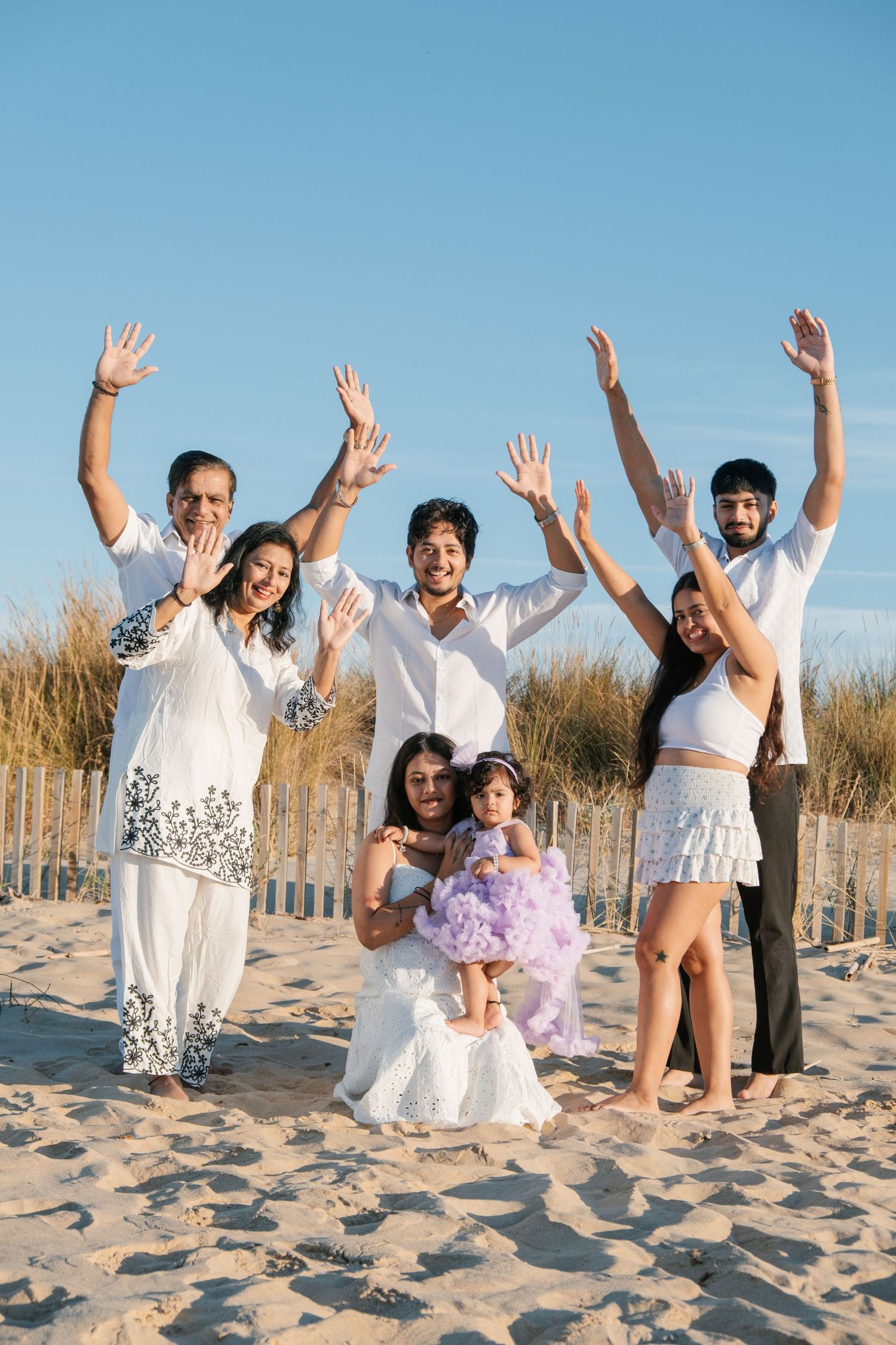 Family gathered around baby