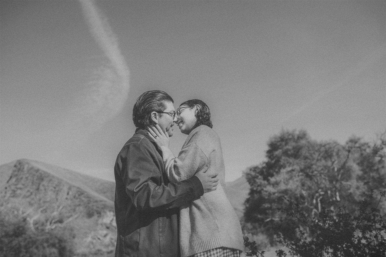 ENGAGEMENT COUPLE ENJOY A MOMENT TIMELESS AT WINTON PARK CALIFORNIA.