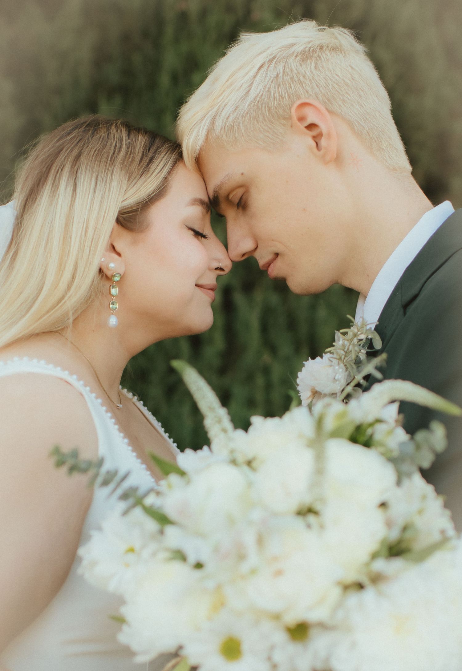 wedding couple forehead to forehead portrait in Fresno,california