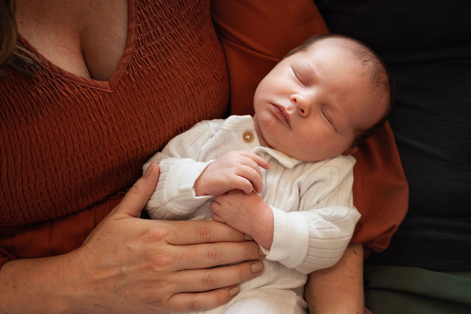 Curled up, safe and sound. In-home newborn session magic right here in Westerville.