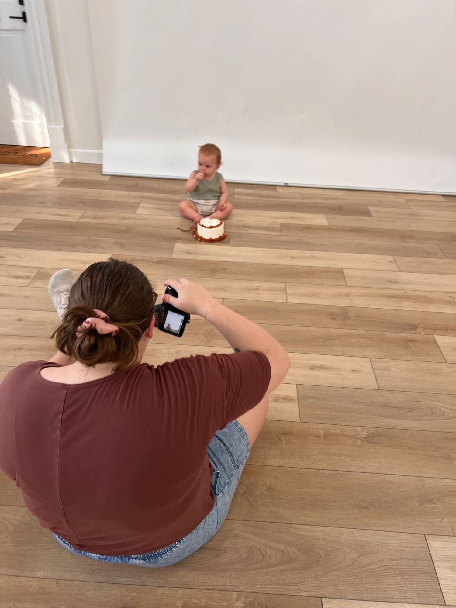 Capturing a baby’s cake smash milestone session in a natural light studio in Columbus, Ohio.