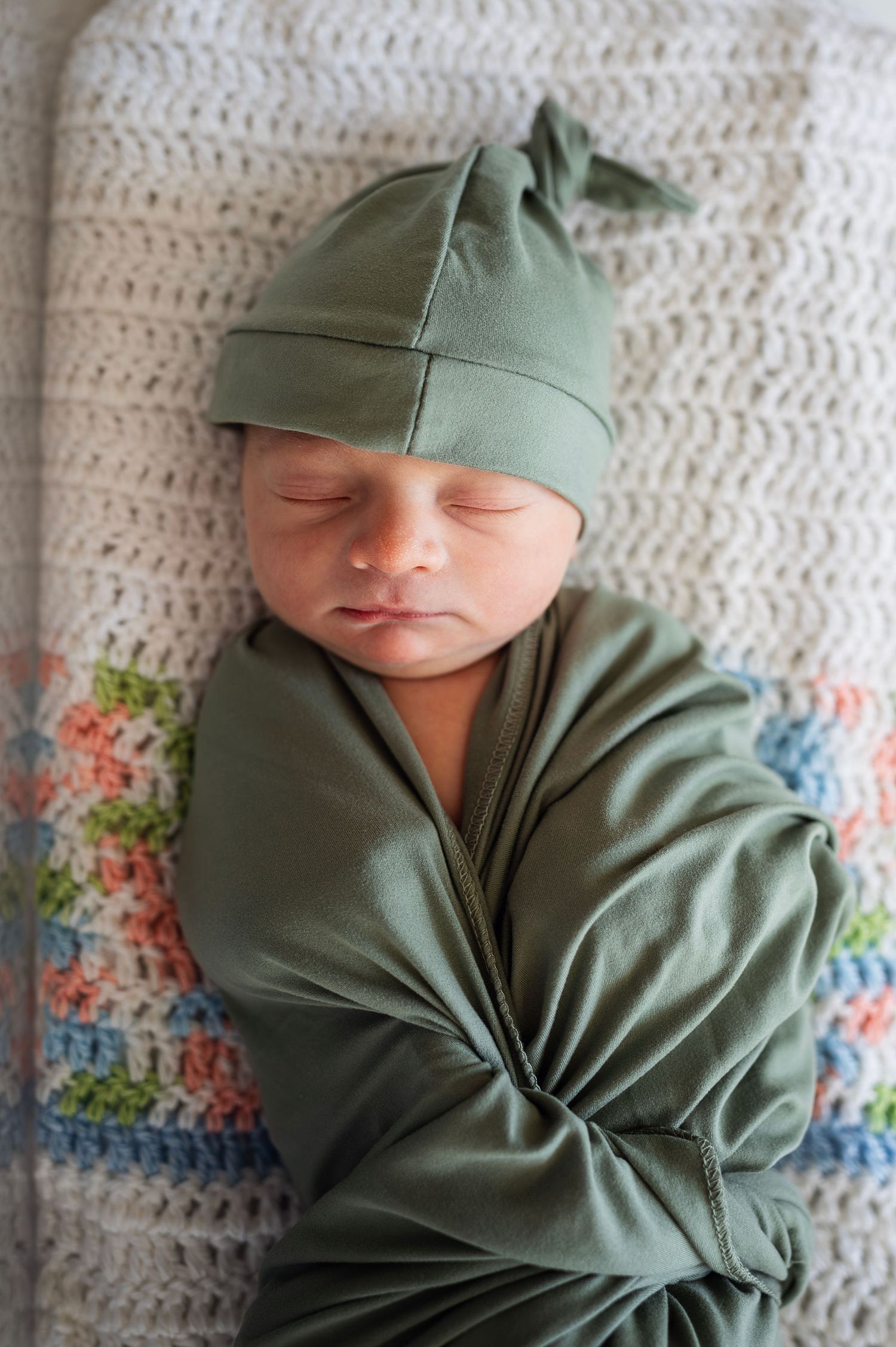 Fresh 48 newborn photo: Swaddled and sleeping peacefully. Captured in-hospital by your Westerville newborn photographer.