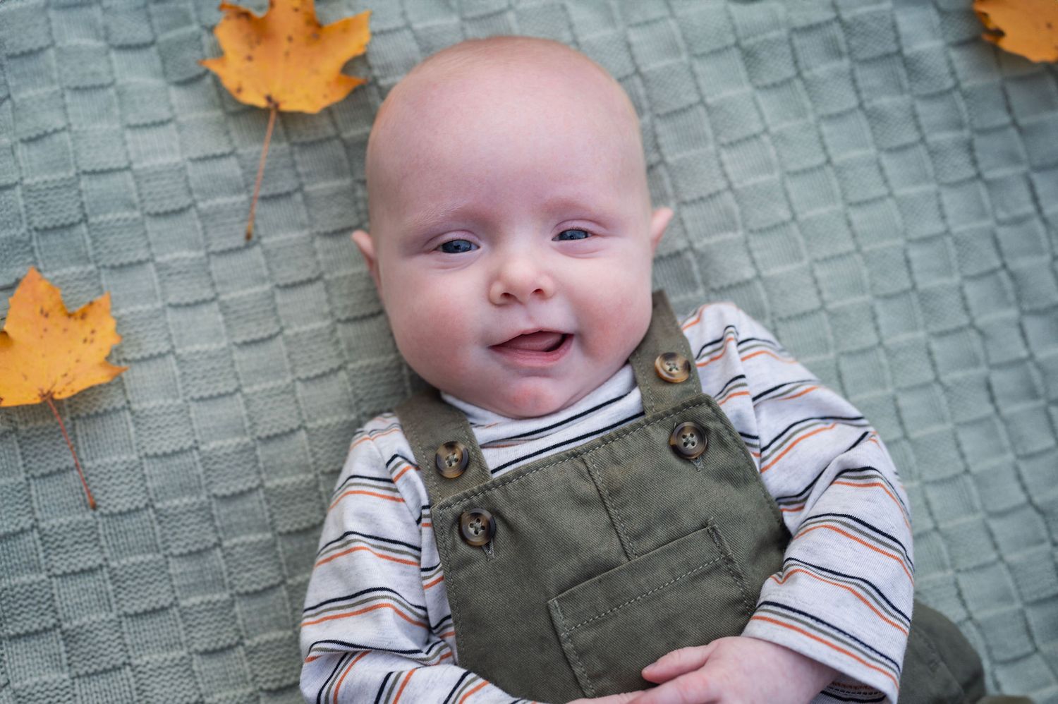 The tiniest smile from the tiniest babe. Fresh 48 session magic with your go-to Westerville newborn photographer.