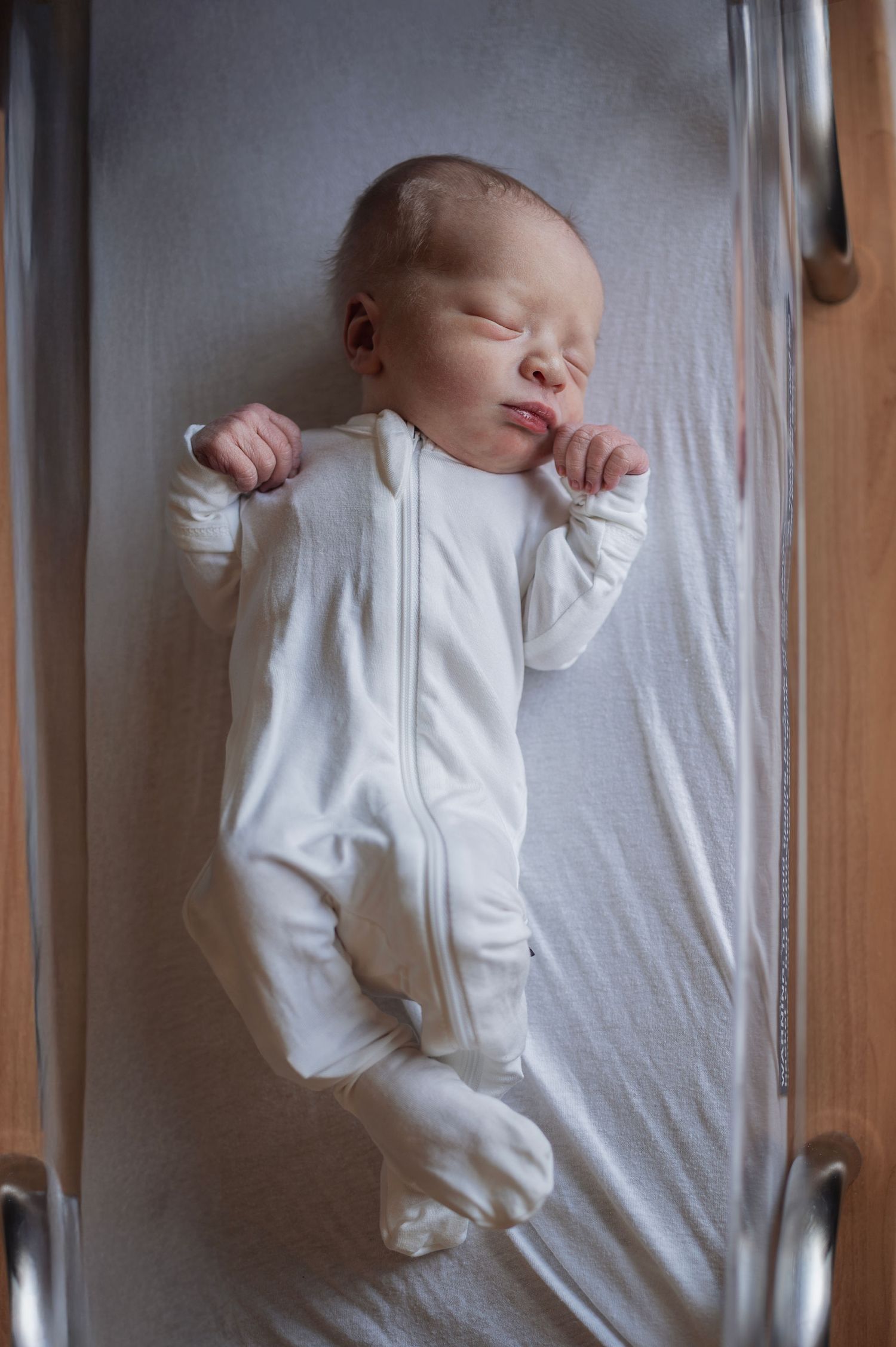 Just hours old and already stealing hearts. Fresh 48 newborn session in Columbus full of soft light and baby yawns.