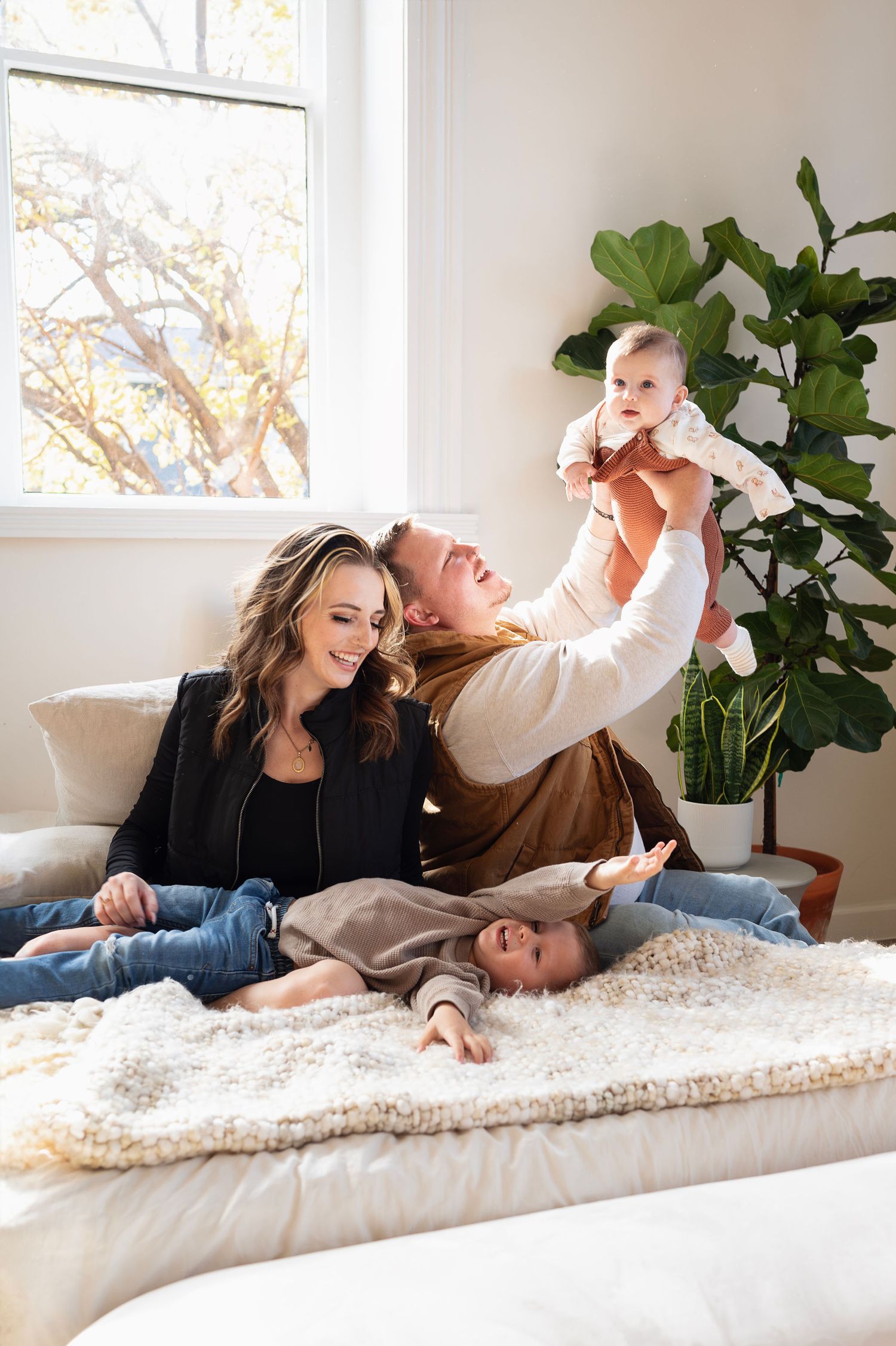A cozy moment between big brother and baby. Westerville family photographer capturing real connection and love.