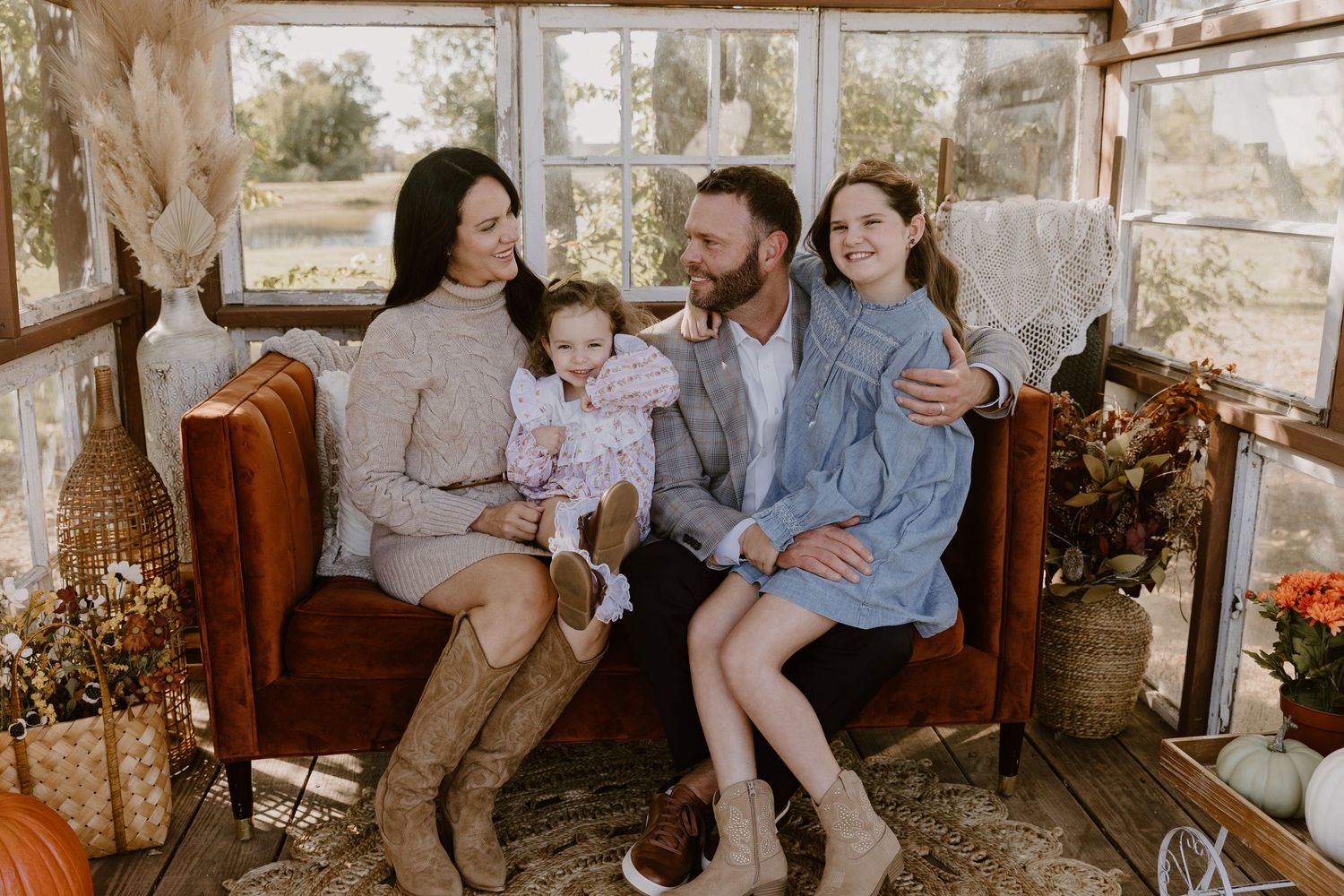A series of warm-toned family lifestyle photos showing intimate moments in a rustic home setting.