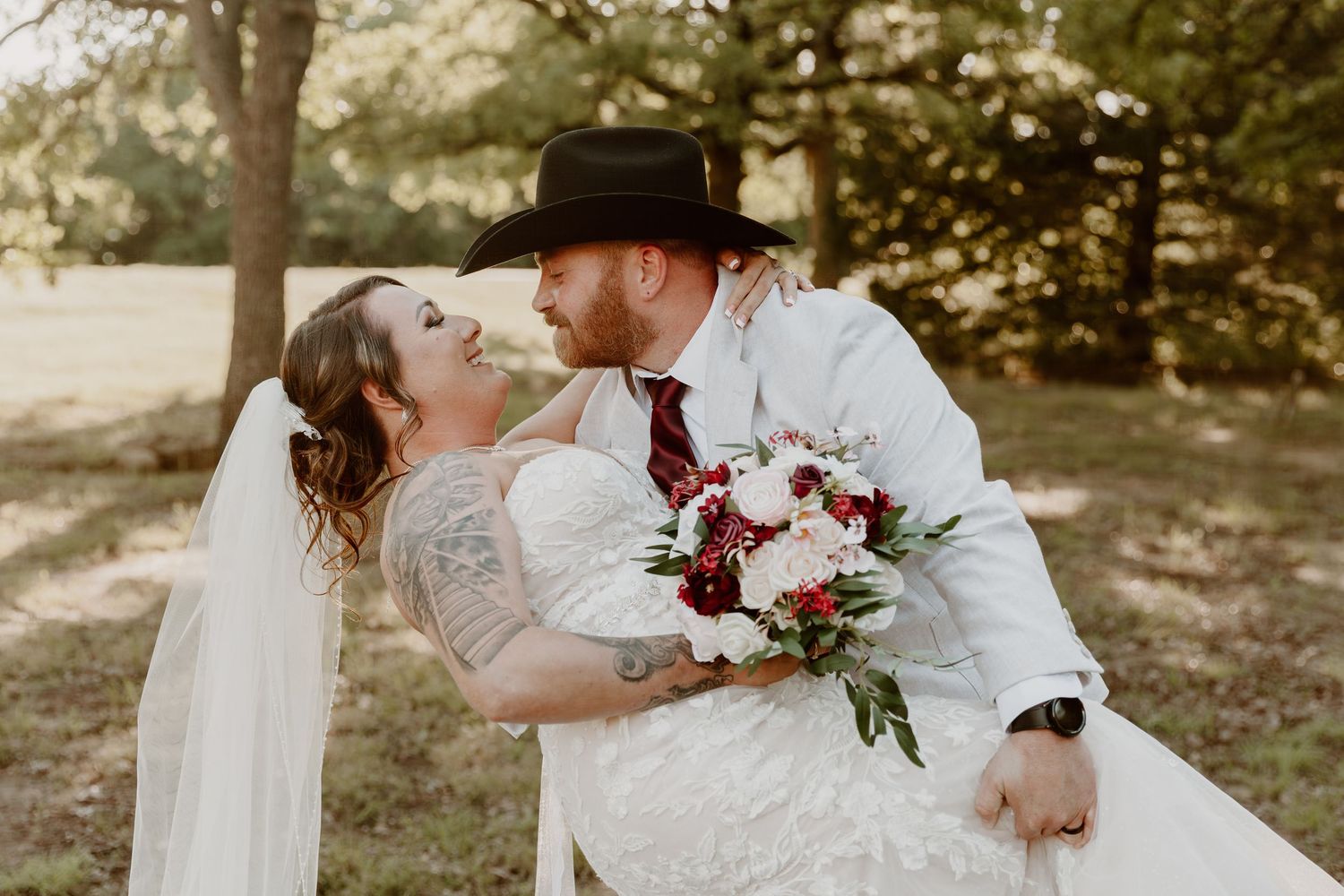 A romantic wedding photo series shows tender moments between a couple in a sunlit outdoor garden setting.