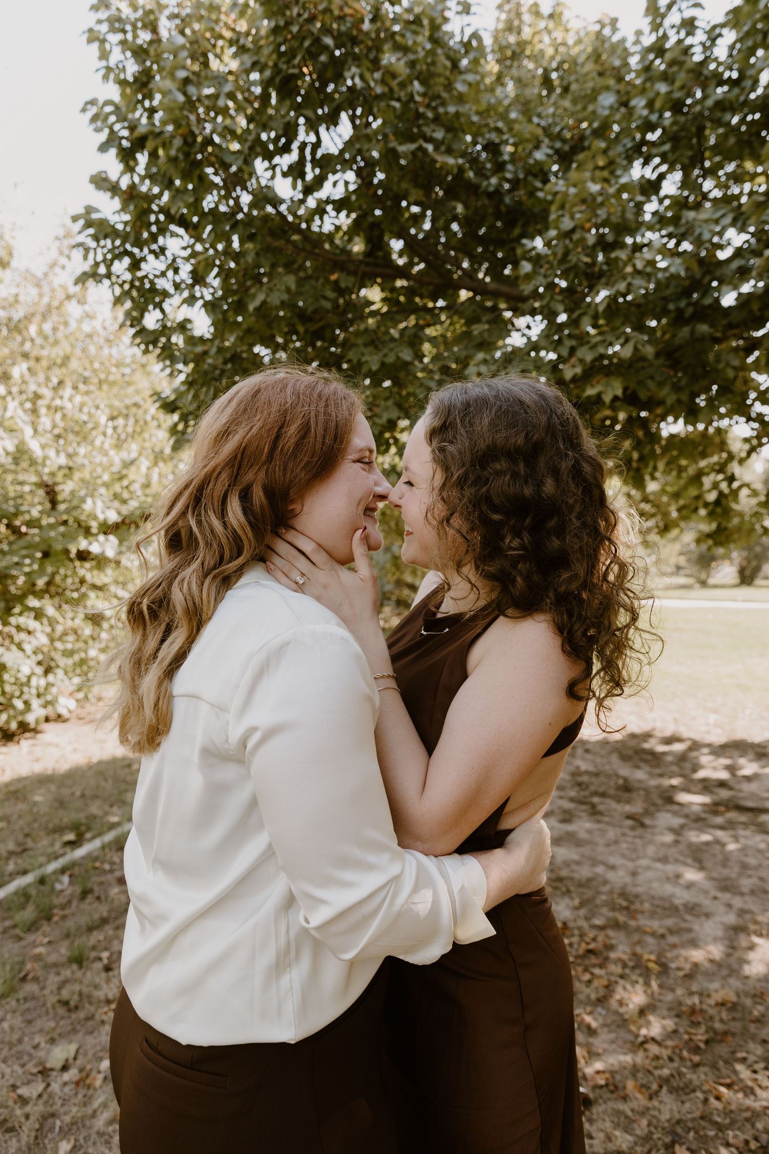A tender moment captured in a series of intimate outdoor photos showing affection between two people in natural lighting.