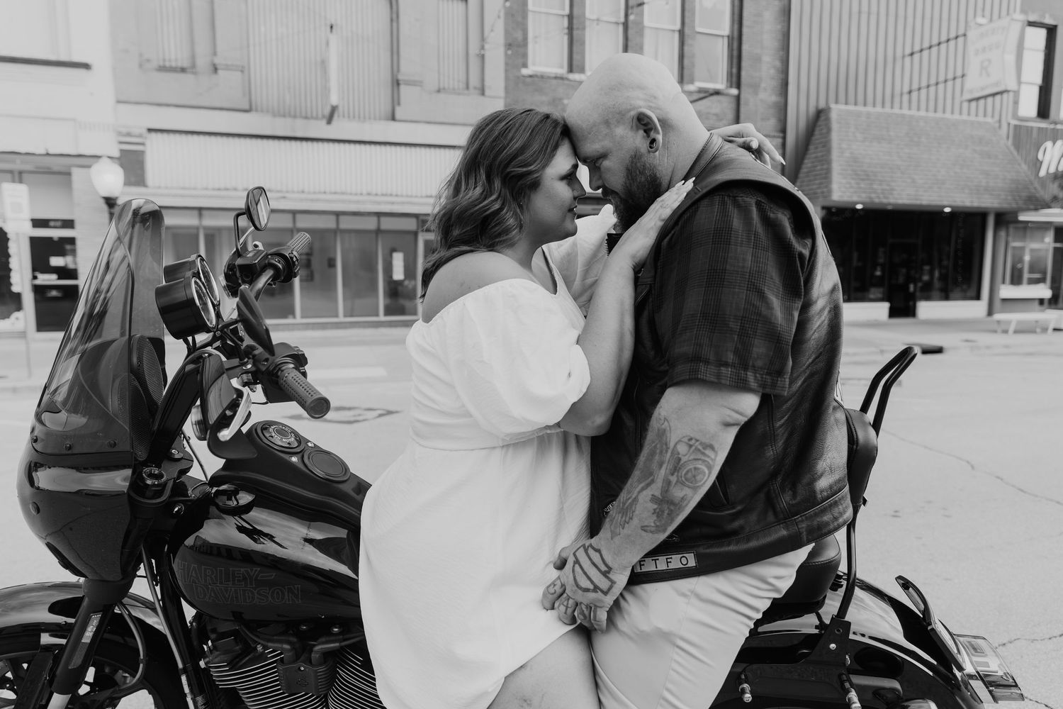 Black and white multiple photo collage capturing intimate moments of a wedding day celebration.