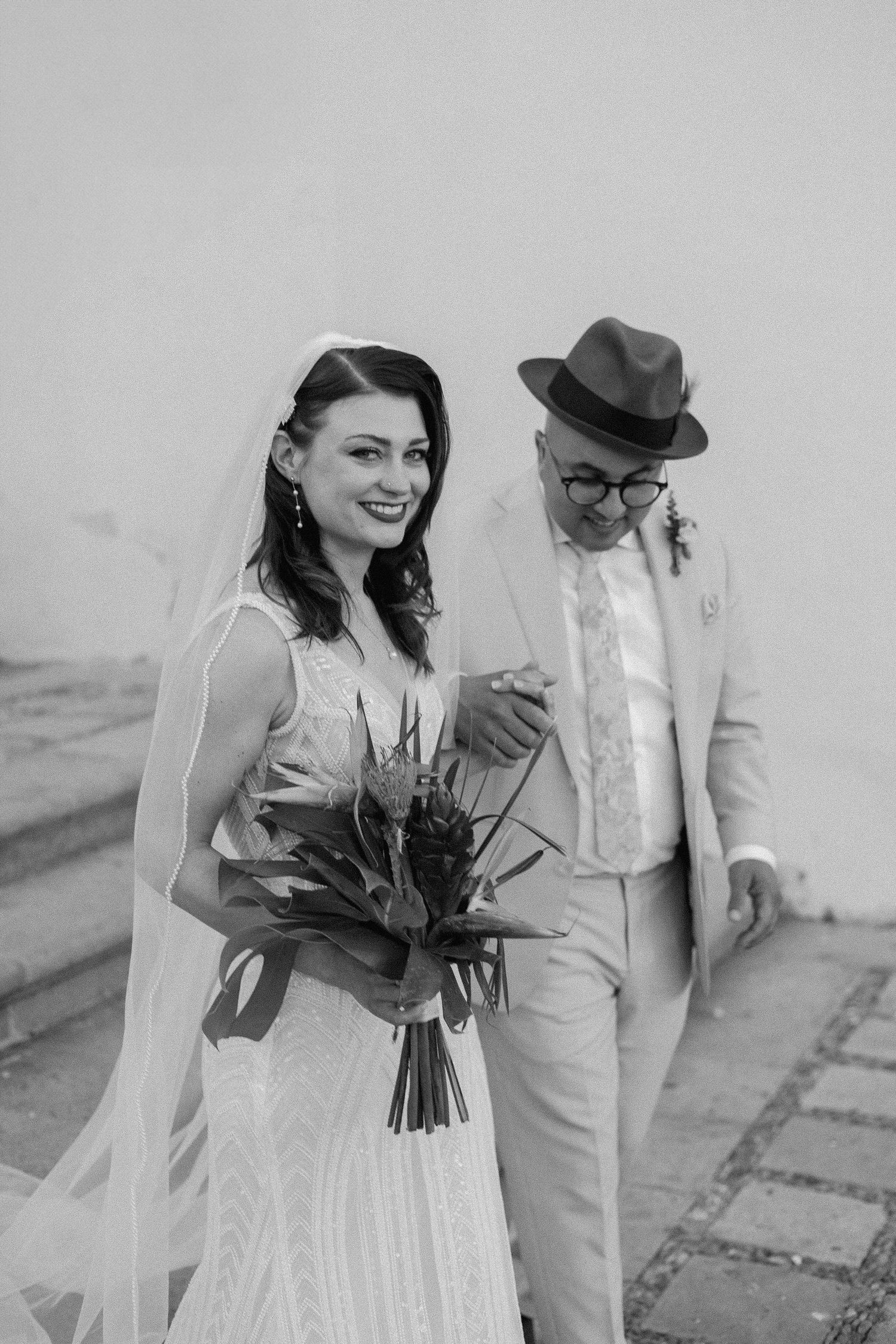 Vintage-style black and white photos of a couple in retro wedding attire posing outdoors.