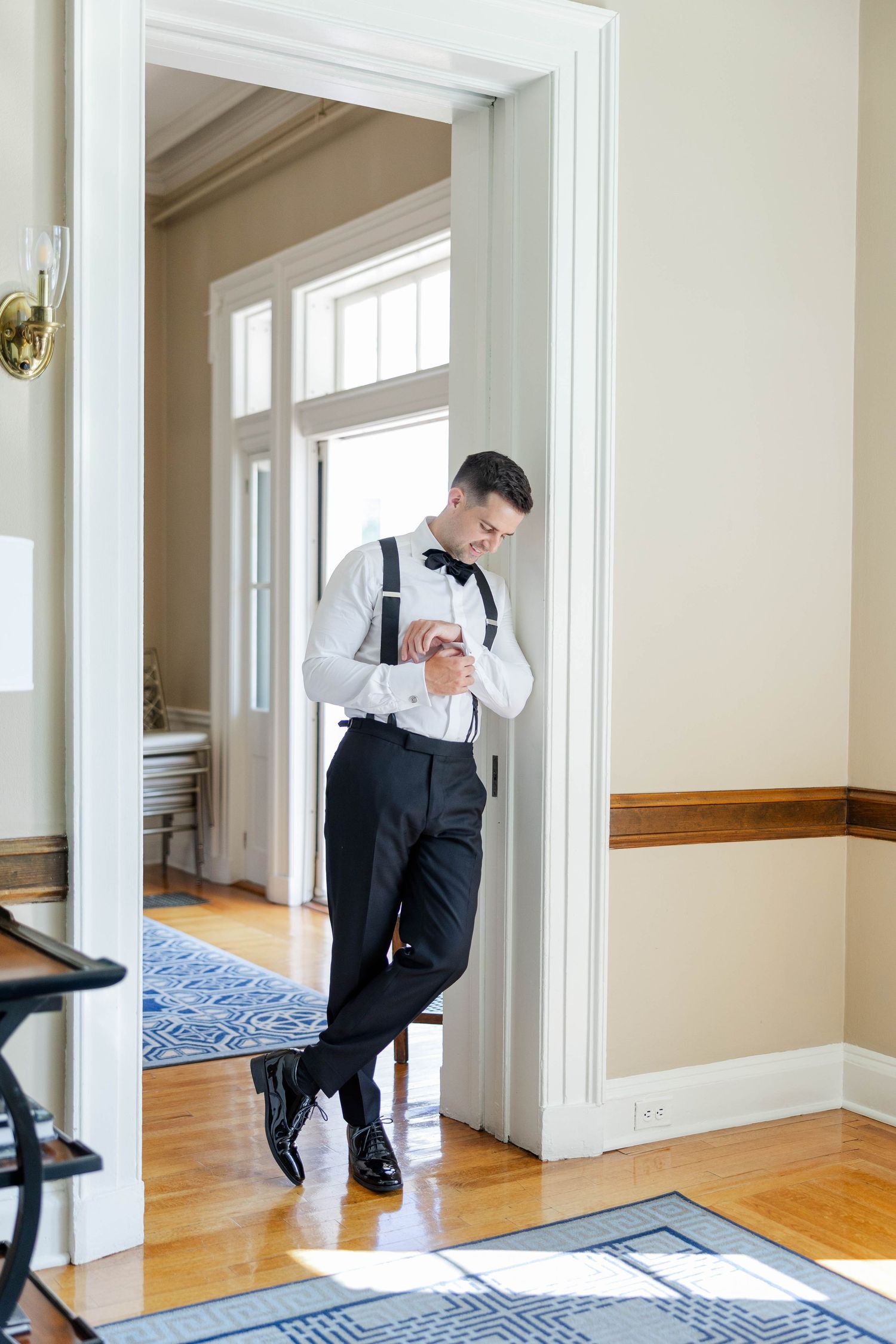 A sequence of images showing a person in business attire demonstrating stretching exercises in an office hallway.