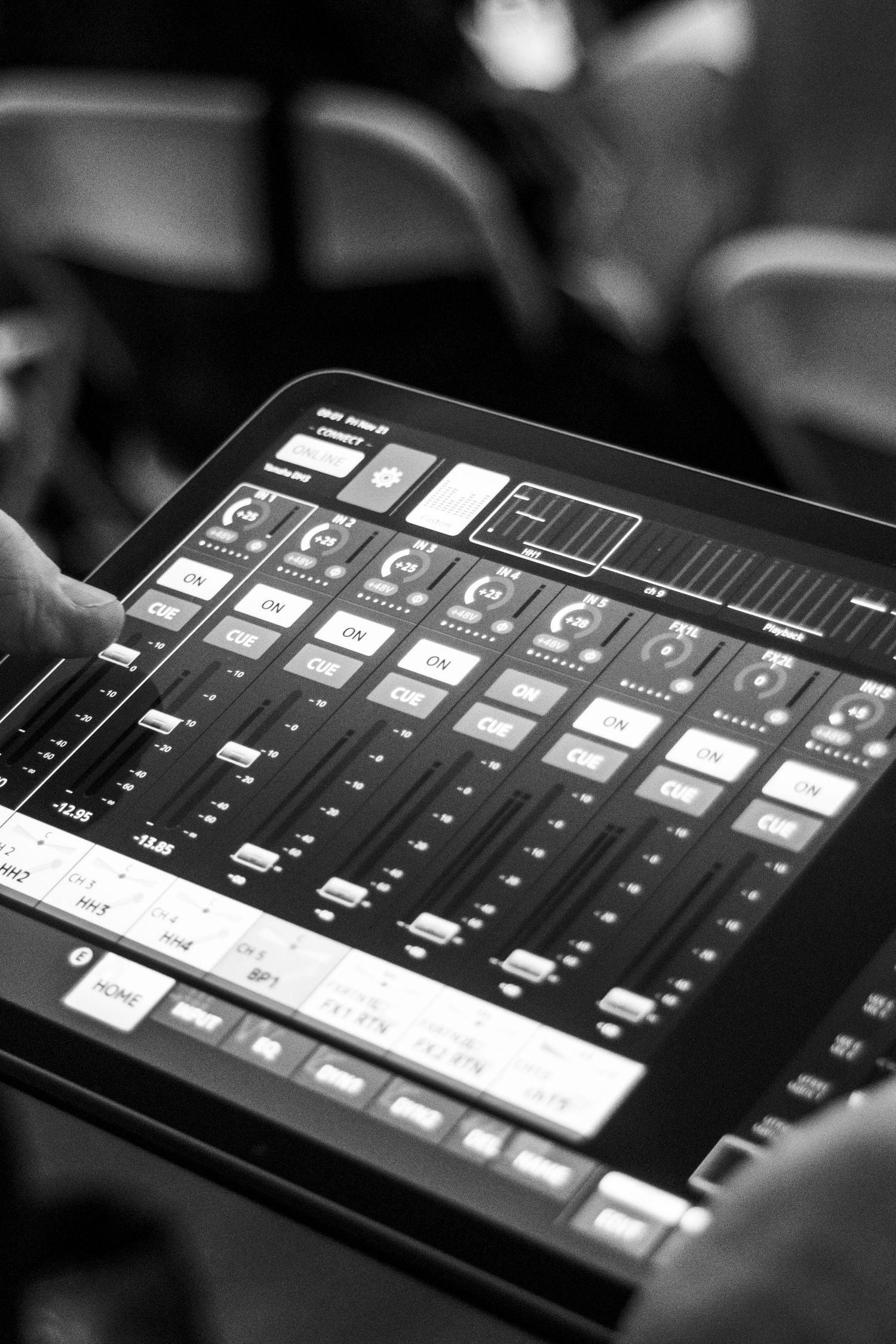 Professional audio mixing console interface displayed on a digital touchscreen in black and white.