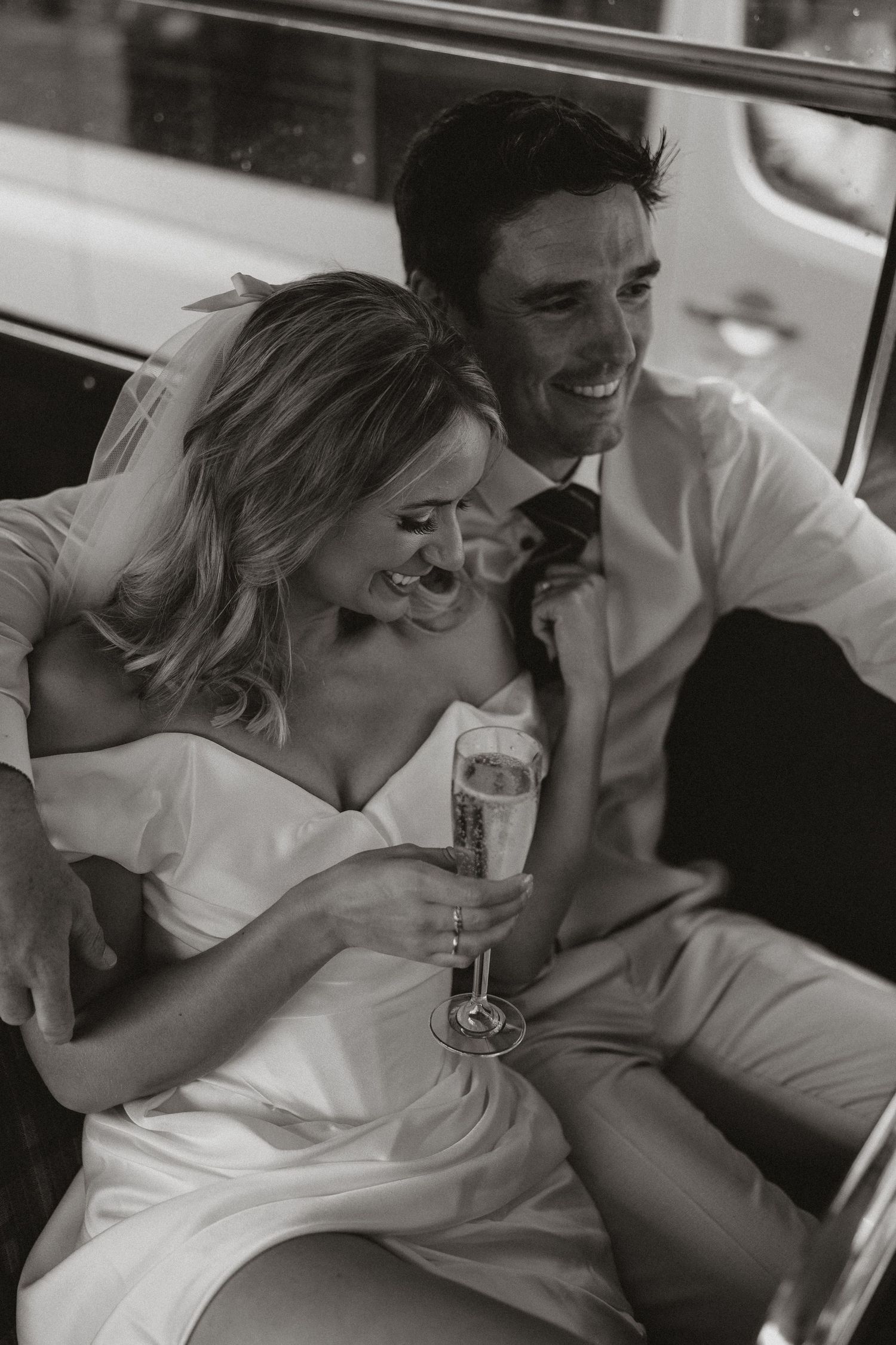 A romantic black and white photo sequence shows a couple sharing intimate moments in what appears to be a car.